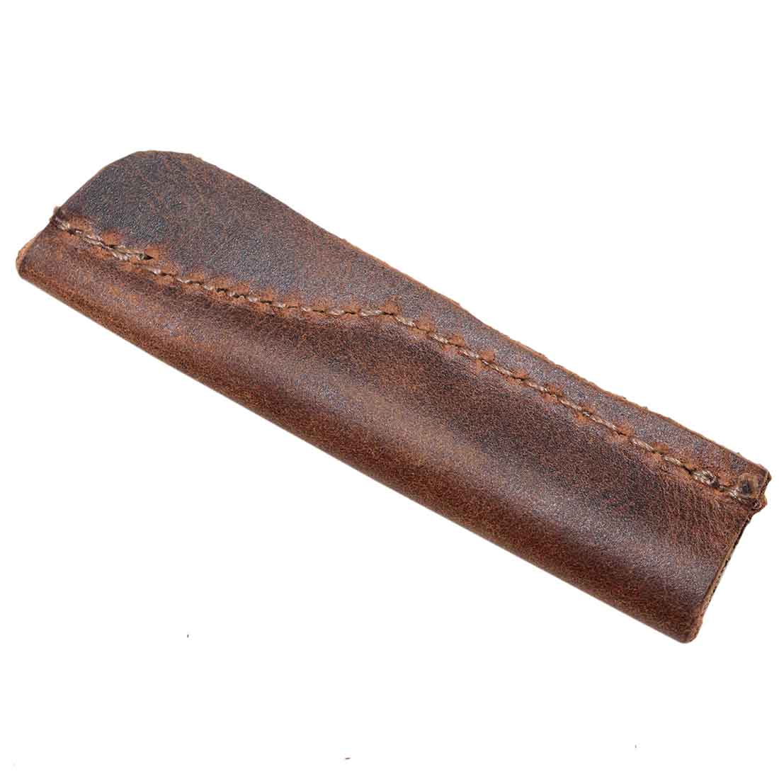 Elegant design of a Hide & Drink Pencil Cap (6 Pack) highlighting the unique leather texture. These small batch production caps serve as trendy accessories and provide excellent protection for pencil leads while being hand sewn by skilled artisans.