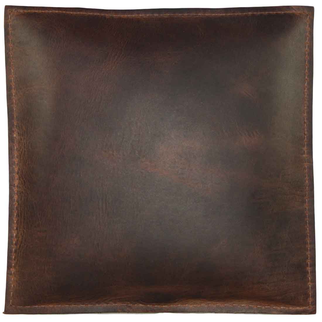 Hide & Drink Decorative Pillow made from premium full grain leather, ideal for styling your couch, sofa, or bed. This 12 x 12 in. pillow adds a unique touch to home and office accessories. Each piece is hand cut, hand sewn, and fire branded by talented artisans in La Antigua Guatemala & Oaxaca Mexico.