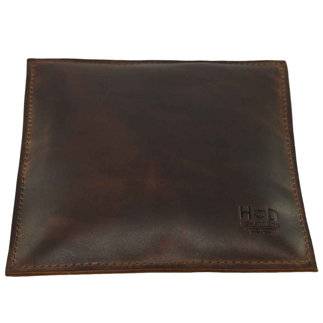 Elegant Hide & Drink Decorative Pillow, a 12 x 12 in. accessory crafted from full grain leather, perfect for adding stylish decor to your couch, sofa, or bed. This pillow is part of small batch production, hand cut, hand sewn and fire branded, made by artisans in La Antigua Guatemala & Oaxaca Mexico.