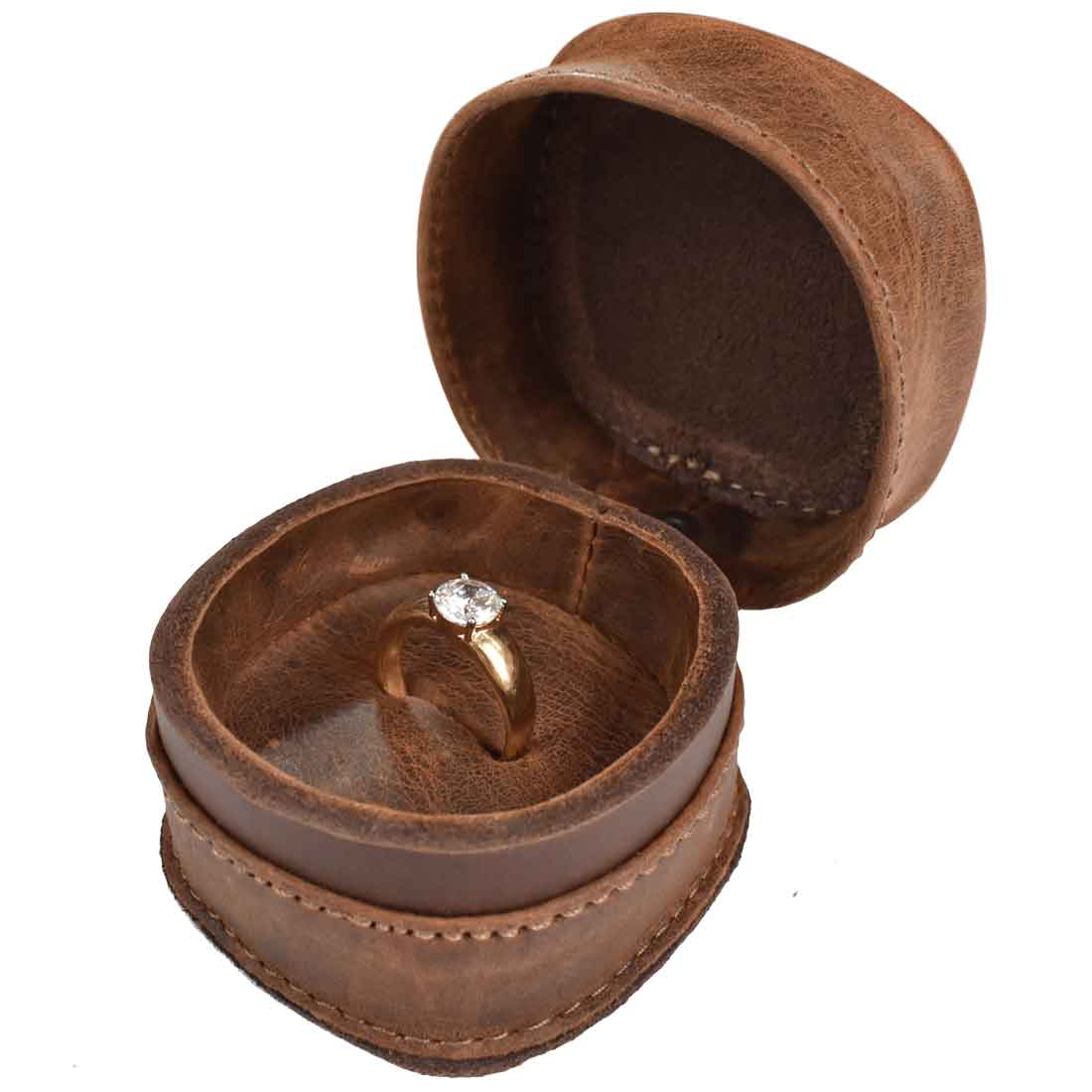 Wedding Ring Box featuring a gold engagement ring inside. Made by Hide & Drink from Full Grain Leather, this small batch production item is a perfect gift for newlyweds, combining stylish design with handmade quality from skilled artisans in La Antigua Guatemala & Oaxaca Mexico.