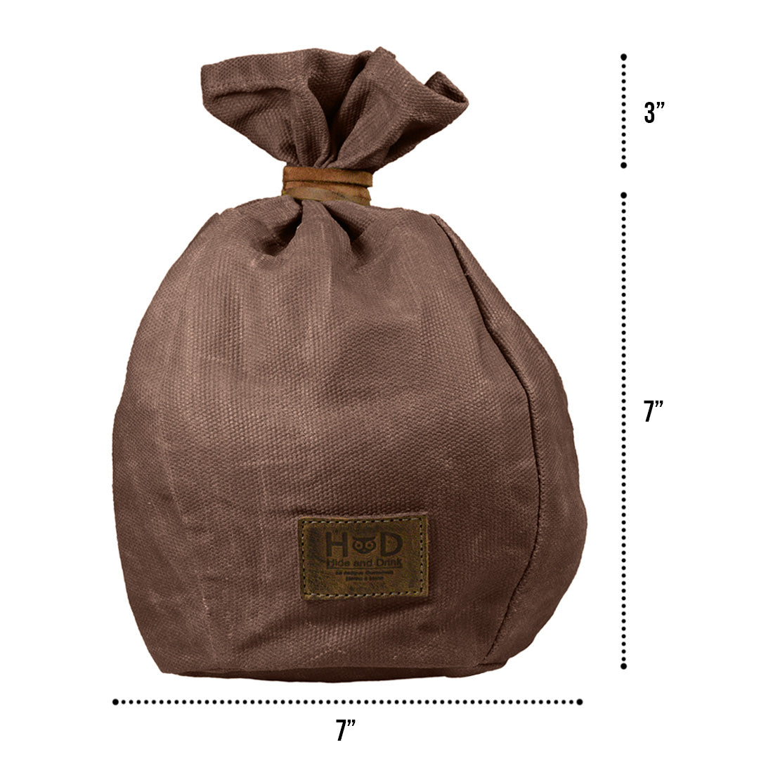 Bushcraft Tinder Bag by Hide & Drink, demonstrating a stylish Waxed Canvas finish. This water resistant outdoor pouch is an essential camping accessory that features small batch production, along with meticulous hand cut and hand sewn artistry. Artisan made in La Antigua Guatemala & Oaxaca Mexico.