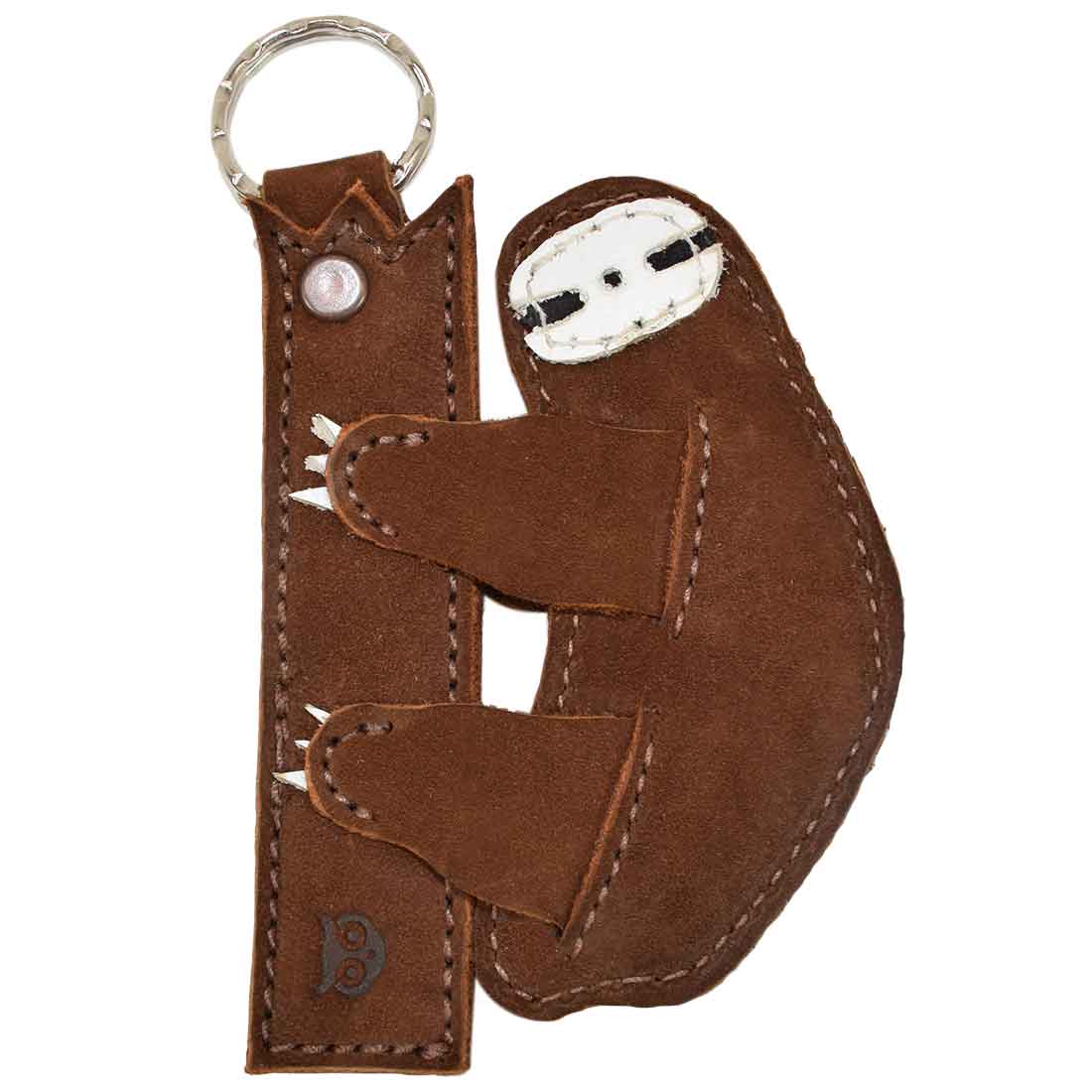 Sloth Critter Key Chain by Hide & Drink, emphasizing its unique shape and quality details. This whimsical Animal Key Ring Holder is crafted from durable Full Grain Leather, perfect for organizing keys in a fun way. Handmade in La Antigua Guatemala & Oaxaca Mexico.