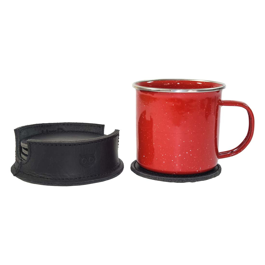 Thick Leather Coasters (6-Pack) by Hide & Drink next to a red cup, demonstrating the practical use of these charcoal black circular coasters made from durable full grain leather. Each artisan piece is part of small batch production and showcases hand cut, hand sewn, and fire branded craftsmanship, handmade in La Antigua Guatemala.