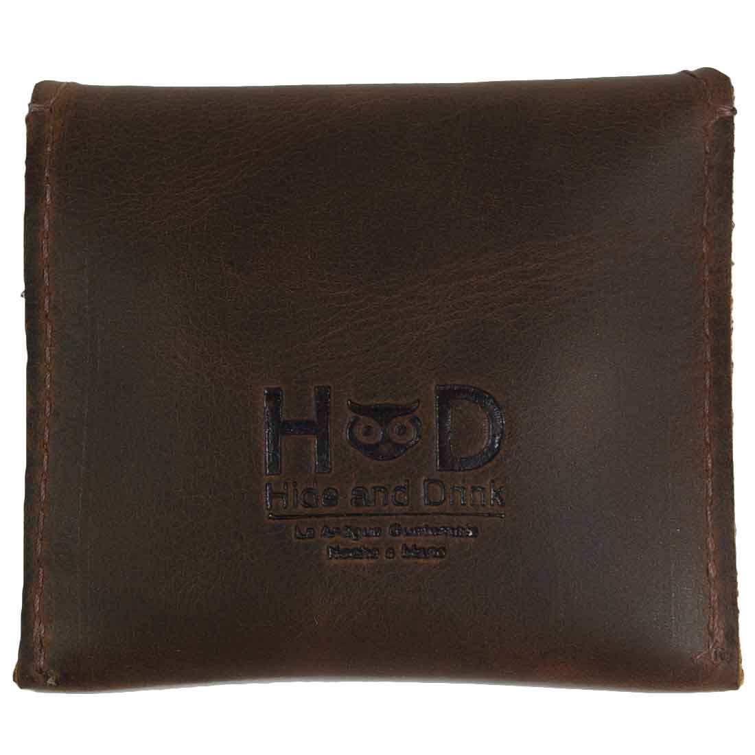 Hide & Drink Tampon Case showcasing the brand logo, illustrating premium craftsmanship in a versatile leather pouch for tampons or condoms. This artisan piece is made in small batches in La Antigua Guatemala.