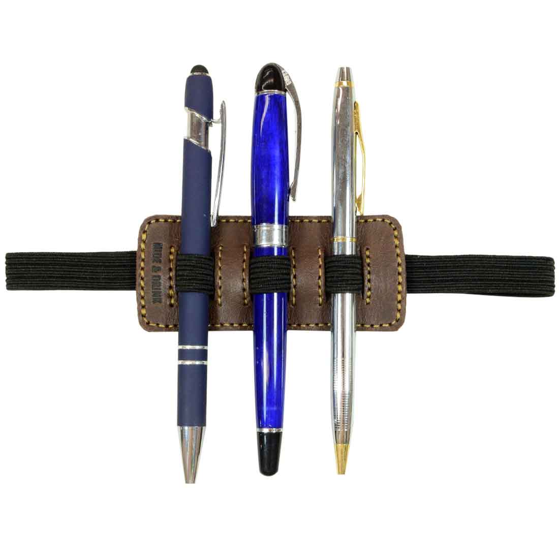 Three pens securely held in the Pen Holder W/Adjustable Band by Hide & Drink, demonstrating its functionality and stylish design. A perfect accessory for Bookworms, made with Full Grain Leather and celebrating small batch production.