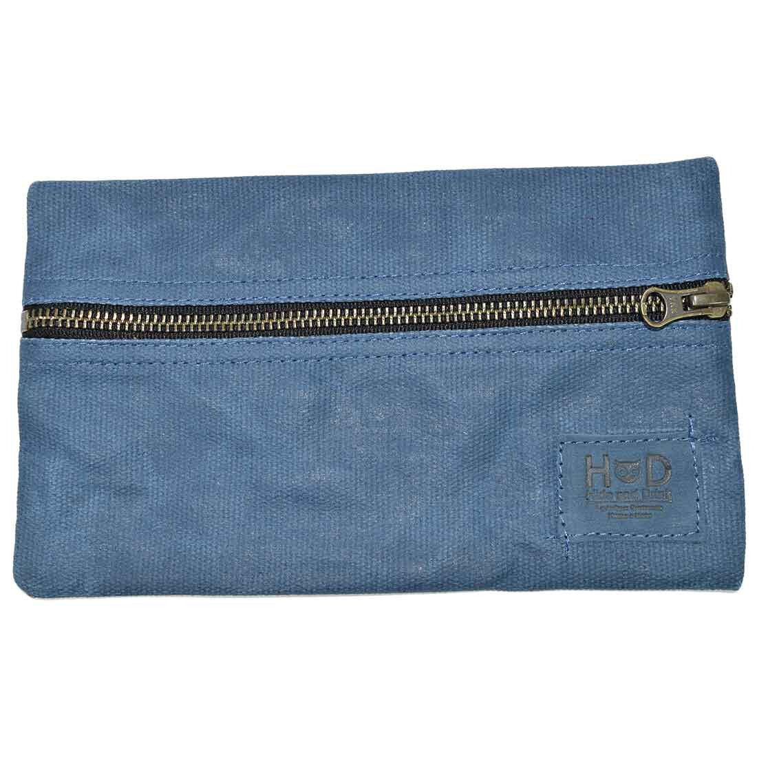 Hide & Drink Utility Cord Pouch presented in a stylish arrangement, emphasizing its chic design. This versatile pouch is a perfect all-purpose utility & charger case for MacBook, iPad & Laptop while also serving as a stylish cable organizer, made in La Antigua Guatemala & Oaxaca Mexico.