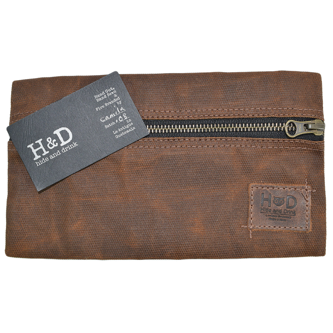 Hide & Drink Utility Cord Pouch highlighted with rich leather touches. Ideal for use as a utility & charger case for MacBook, iPad & Laptop, it functions seamlessly as a cable organizer, showcasing artisan quality from La Antigua Guatemala & Oaxaca Mexico.