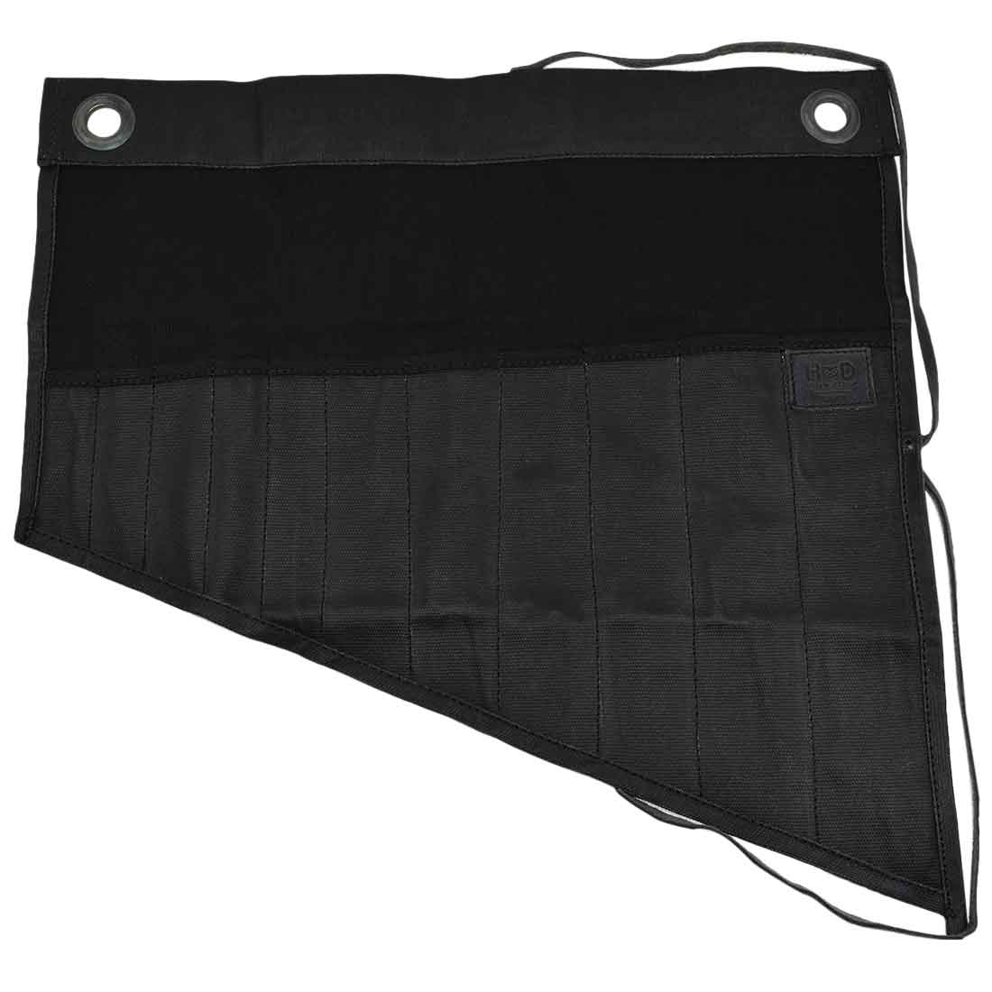 Hide & Drink's Wrench Roll (11 Pockets) presented open in black, featuring well-structured pockets for tools. This Wrench Tool Roll is a superb choice for craftsmen looking for hanging storage. Crafted from high-quality waxed canvas, this rustic organizer shows a commitment to small batch production, hand cut and hand sewn details, and fire branding, handmade in La Antigua Guatemala & Oaxaca Mexico.