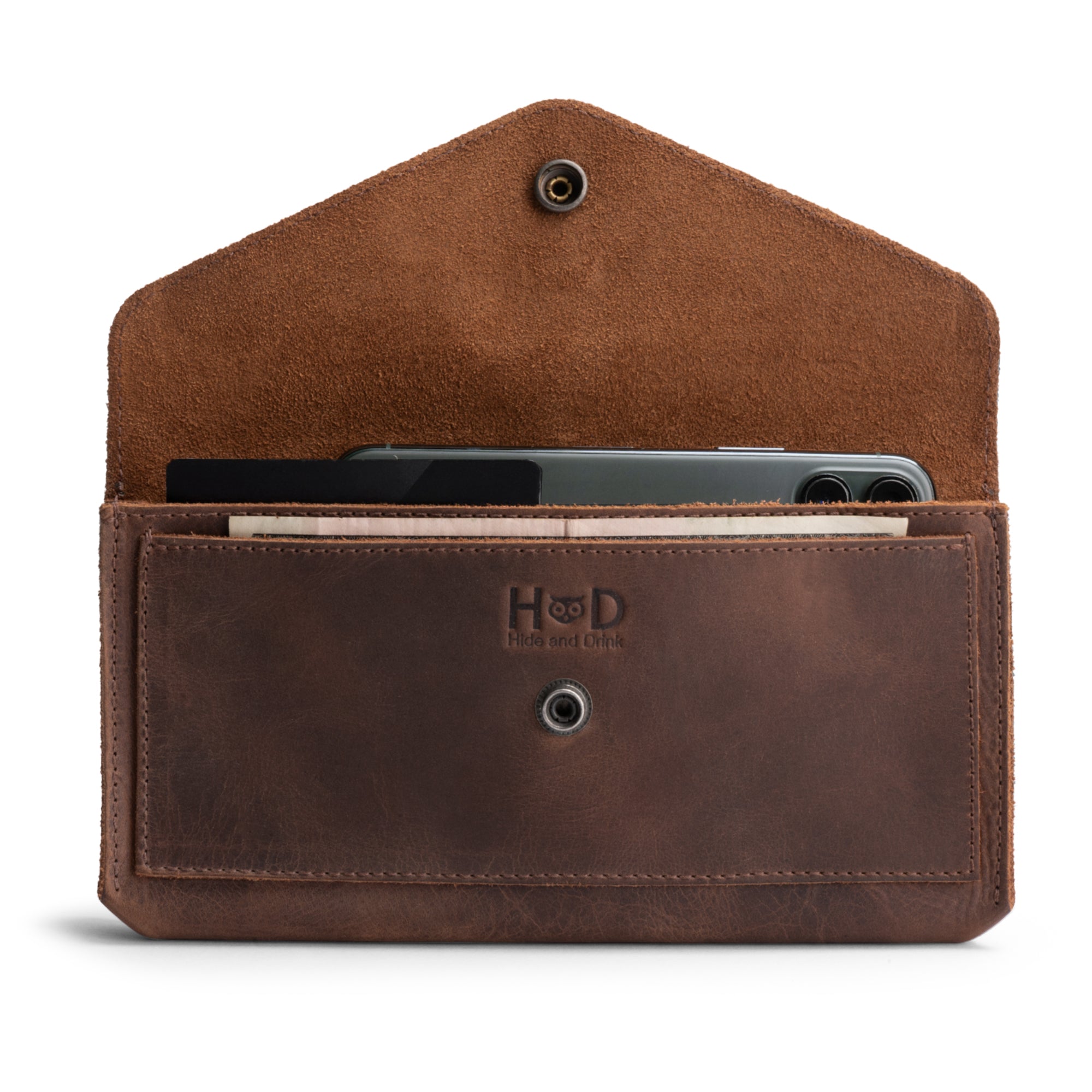 A close-up of the Large Female Wallet by Hide & Drink, showcasing its spacious interior with cash and cards, emphasizing its role as a Travel Organizer for Women. This Vintage Money and Card Holder is made from premium Full Grain Leather, reflecting the brand's commitment to Small Batch Production and Hand Cut, Hand Sewn Artisan craftsmanship, all Handmade in La Antigua Guatemala & Oaxaca Mexico.