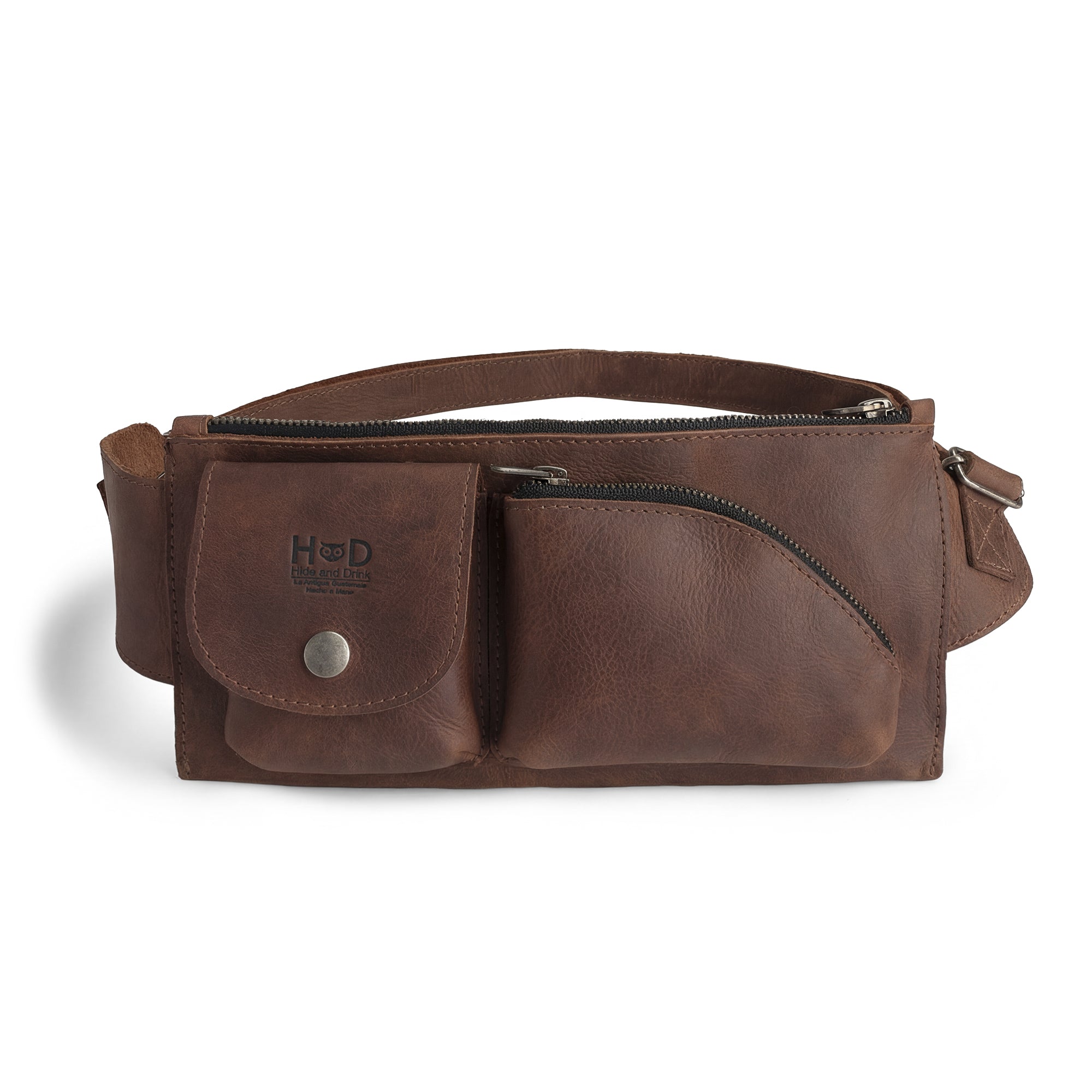 Crossbody Multi-Pocket Bag by Hide & Drink showcasing a stylish design in dark full grain leather. This versatile Crossbody Bag can be used as a Messenger Bag or Shoulder Bag, perfect as a Travel Accessory. The craftsmanship is evident with its hand cut and hand sewn details, making it a true artisan piece from small batch production in La Antigua Guatemala & Oaxaca Mexico.