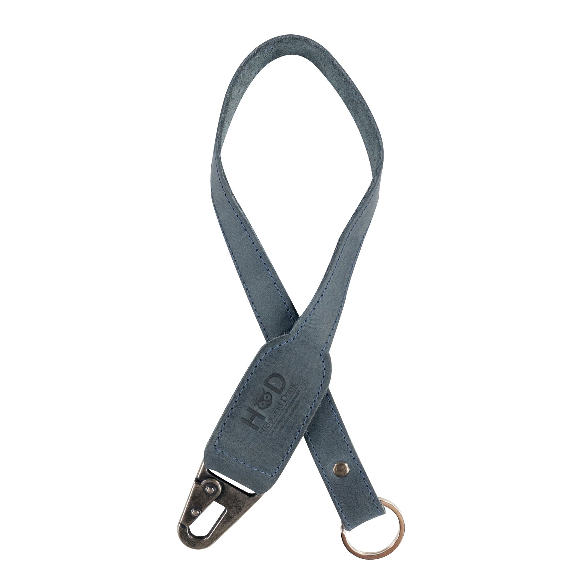 Hide & Drink Keychain Lanyard made from Full Grain Leather, featuring a handy clip for house, car, and apartment keys. It highlights artisan craftsmanship and small batch production.