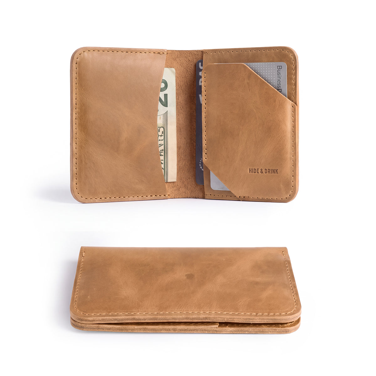 Open view of the Bi-Fold Card Wallet Diagonal by Hide & Drink in brown leather, showcasing its functionality and minimalist design for organization of cards and folded bills.