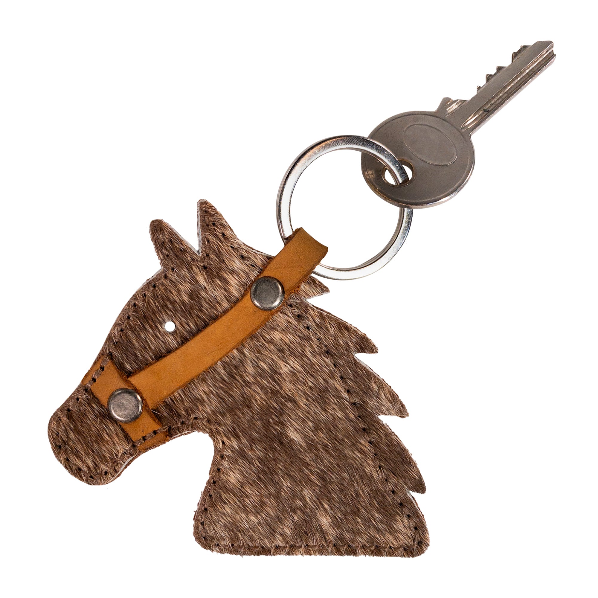 Cowboy Stallion Head Keychain by Western Leather Works featuring a hair-on-hide leather horse head design, showcasing craftsmanship with Full Grain Leather, perfect for added style. This artisan piece is handmade in La Antigua Guatemala & Oaxaca Mexico through small batch production, and measures 3.25 inches long.