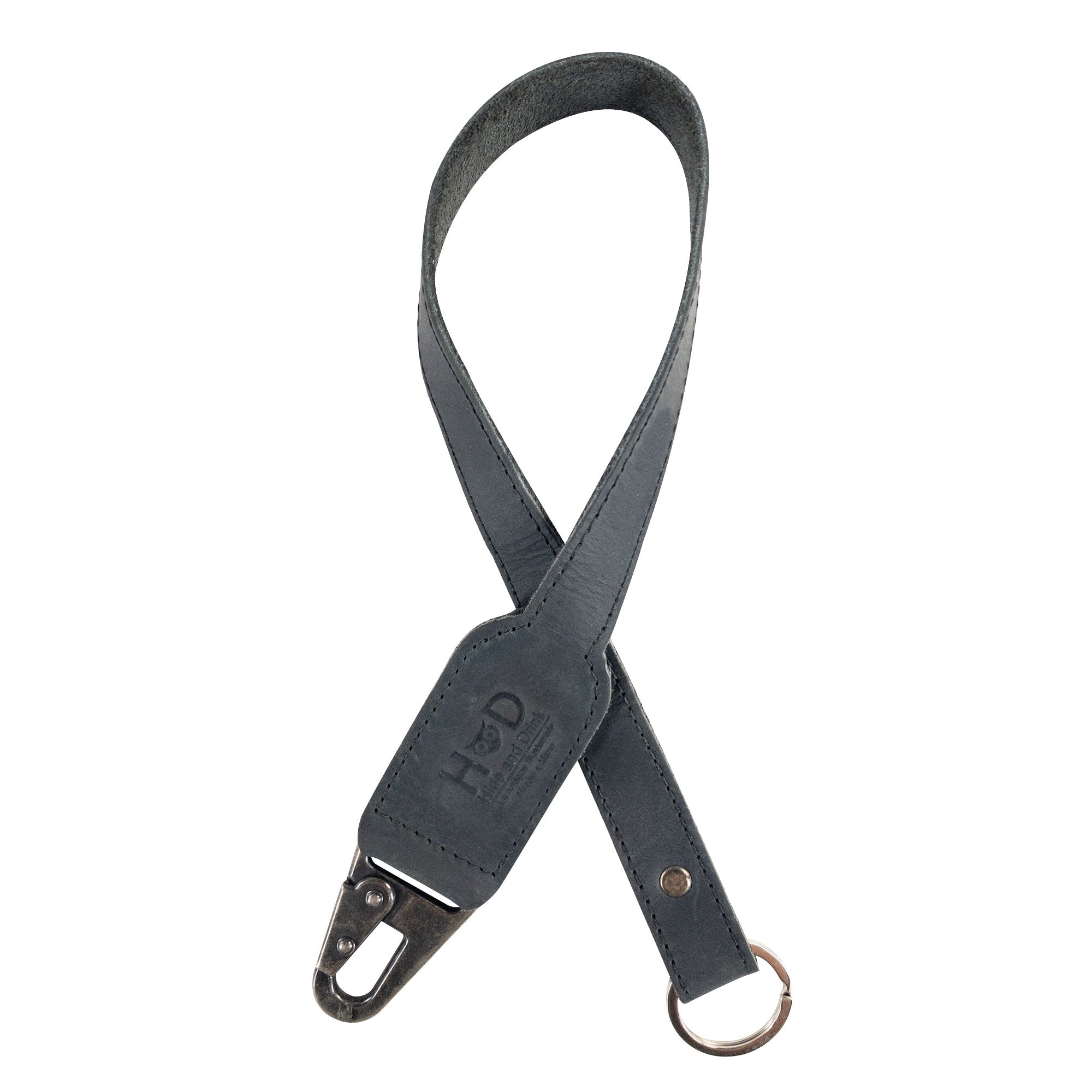 Hide & Drink Keychain Lanyard made of high-quality Full Grain Leather and featuring a sturdy clip for attaching keys. This handmade item represents the charm of small batch artisan production.