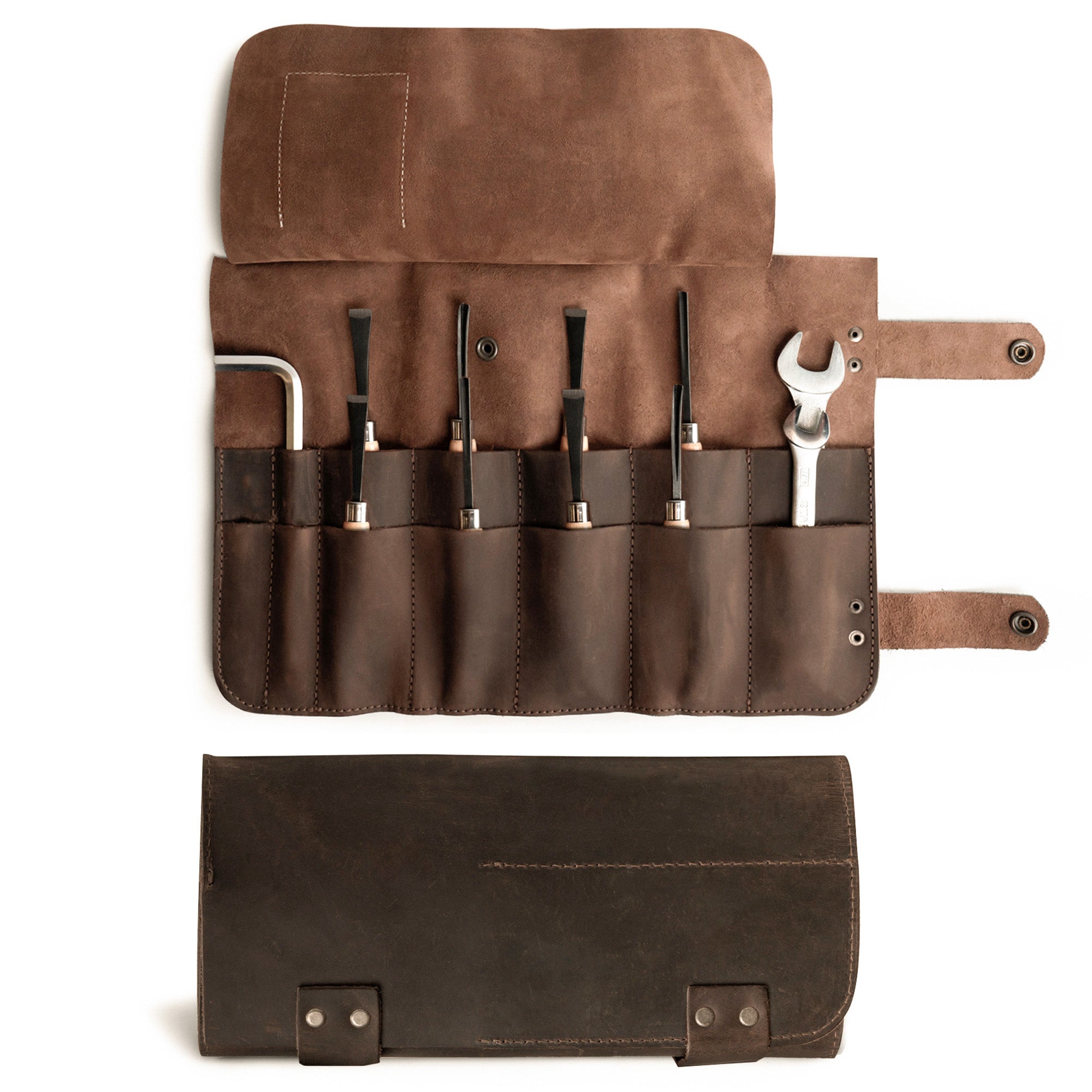 Hide & Drink's Barber Tool Roll, showcasing a Snap Tool Roll Up Bag with 14 Slots, perfect for organizing scissors & screwdrivers. Constructed from Full Grain Leather, this portable carry case embodies StockyardX's commitment to small batch production and artisan craftsmanship, hand cut, hand sewn, and fire branded in La Antigua Guatemala & Oaxaca Mexico.