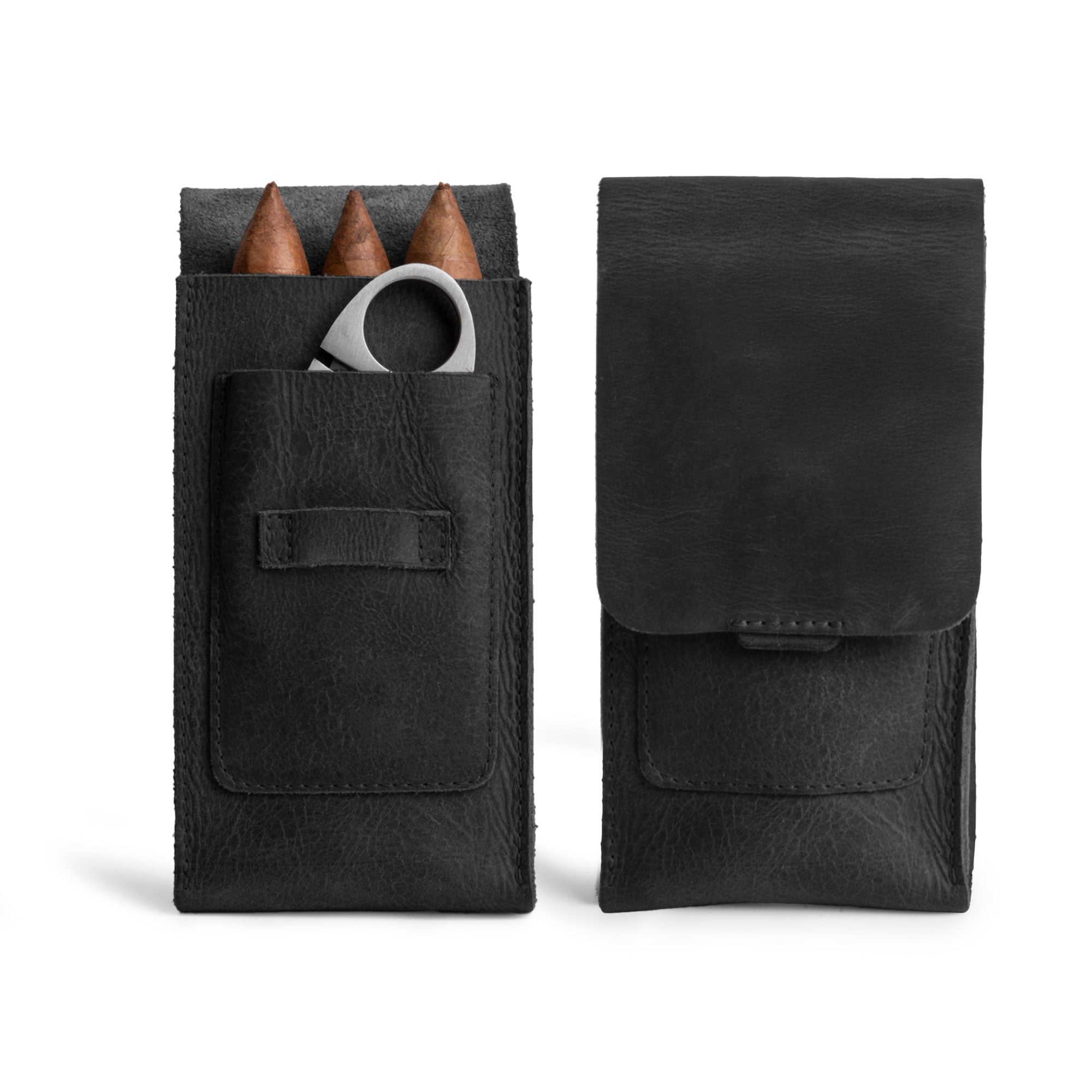 Hide & Drink's black Triple Cigar Holder with Cutter Slot, elegantly designed to hold 3 cigars. This travel leather cigar case is a stylish and portable accessory, perfect for gifts, made from full grain leather in La Antigua Guatemala & Oaxaca Mexico.
