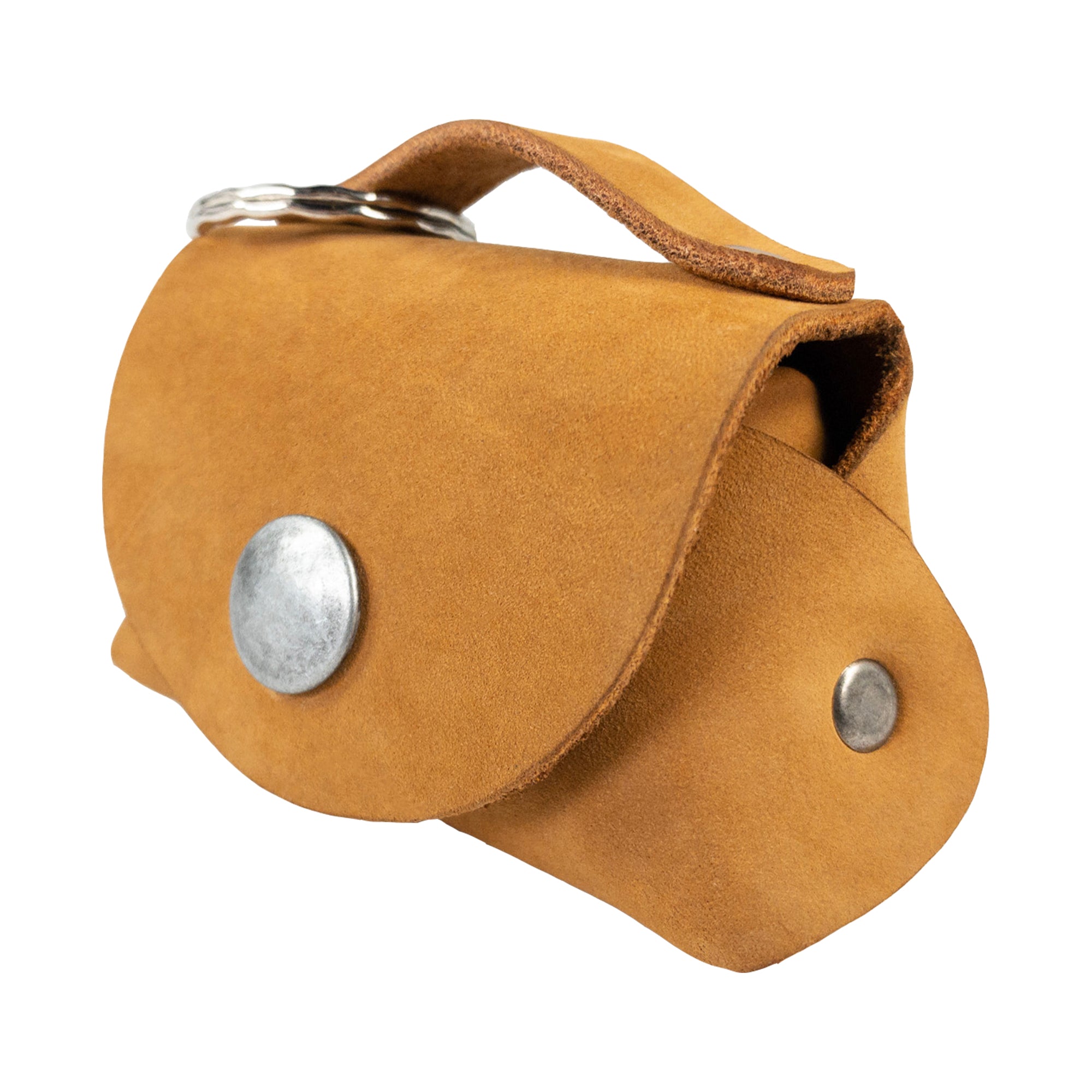 Side view of the Tiny Handbag Keychain by Hide & Drink in a beautiful mustard color, serving as a Tiny Handbag with Key Ring Holder made from Full Grain Leather. This artisan creation is a part of Small Batch Production, Hand Cut, Hand Sewn, and Fire Branded, showcasing the craftsmanship of being Handmade in La Antigua Guatemala & Oaxaca Mexico.