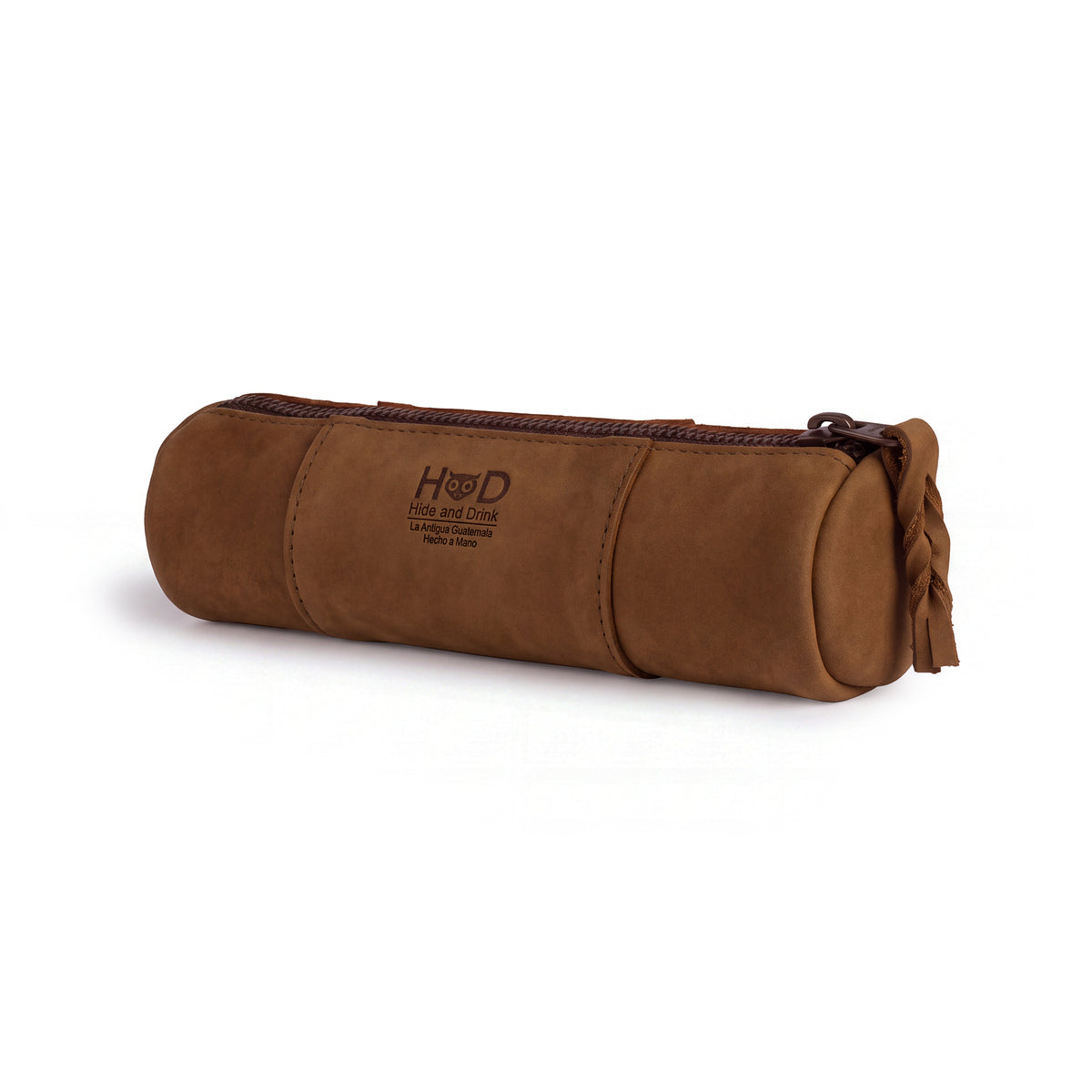 Utility Cylinder Case by Hide & Drink in a solid leather finish, combining rustic charm with functionality. Perfect for keys or cables, this handmade bag showcases artisan craftsmanship in Full Grain Leather. Cylinder Case, Classic Bag, Handmade.