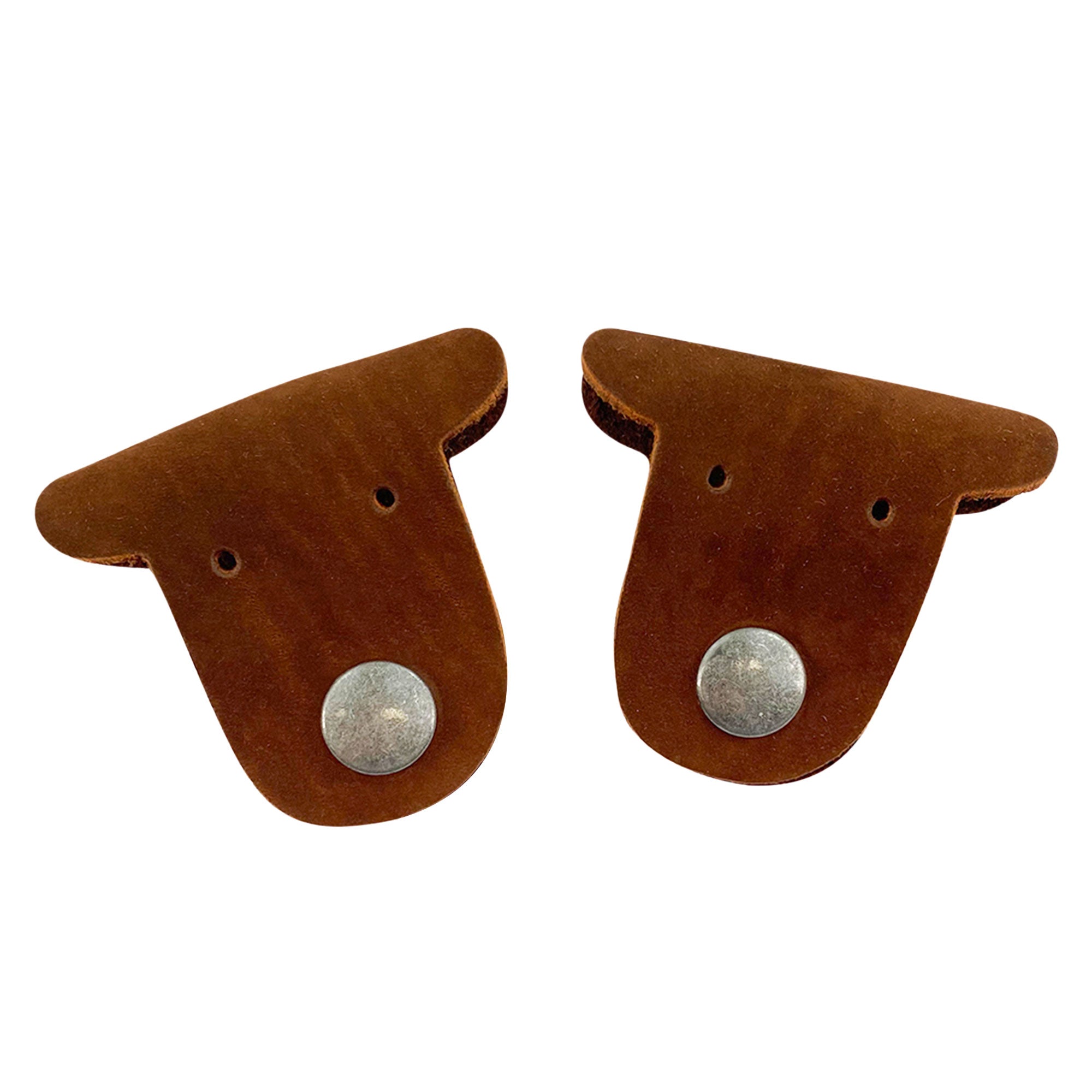 Taco Dog's brown Dog Cord Keepers provide a stylish way to keep your cables organized. Made from premium full grain leather, these handmade accessories feature clip snaps for easy management on-the-go. Experience artisan craftsmanship with this unique 2 pack crafted in La Antigua Guatemala.