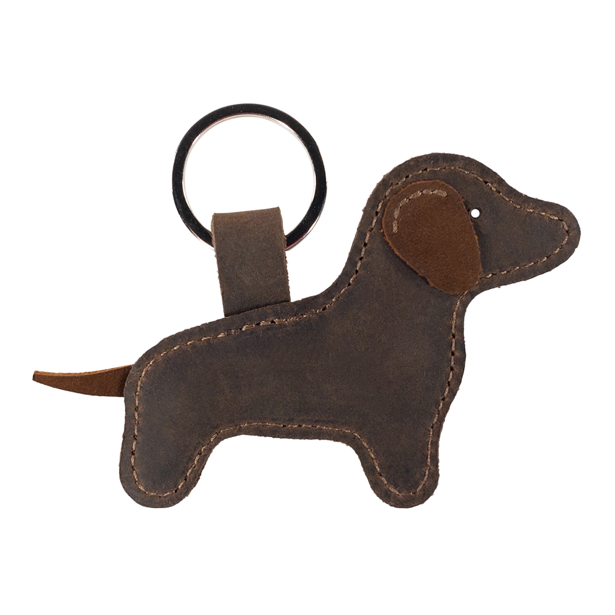 A cute Dog Keychain from Hide & Drink, featuring a charming dog-shaped design, made from soft Full Grain Leather, showcasing artisan craftsmanship. Perfect as a unique Dachshund Keyring, this handmade piece represents small batch production and fire branded quality, all made in La Antigua Guatemala & Oaxaca Mexico.