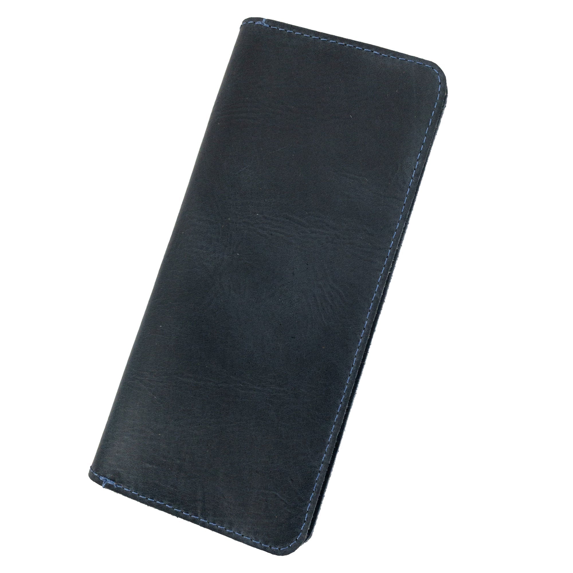 Closed view of the black bifold wallet for cellphone by Hide & Drink, showcasing its elegant and functional design. This Bifold Wallet for Cellphone made from Full Grain Leather is ideal for everyday use. Appreciate the artisan craftsmanship and small batch production from La Antigua Guatemala & Oaxaca Mexico.