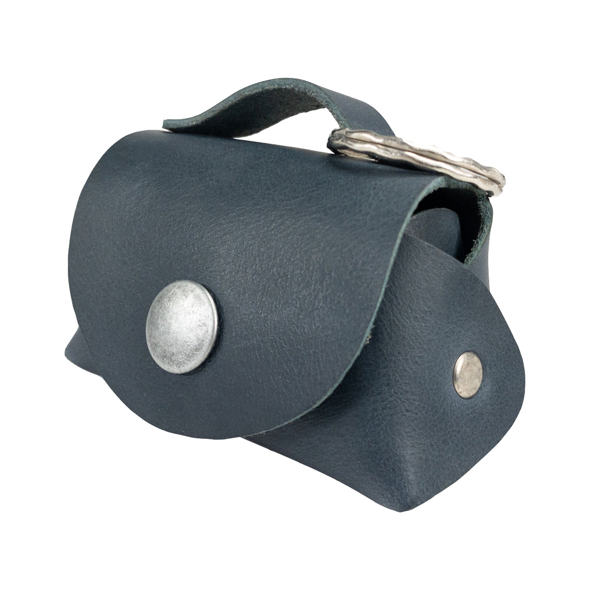 Tiny Handbag Keychain by Hide & Drink displayed in a stylish way, showcasing its Full Grain Leather and Key Ring Holder design, perfect for those who love unique handmade accessories from StockyardX. This artisan piece, crafted with care in La Antigua Guatemala, reflects the quality of small batch production.