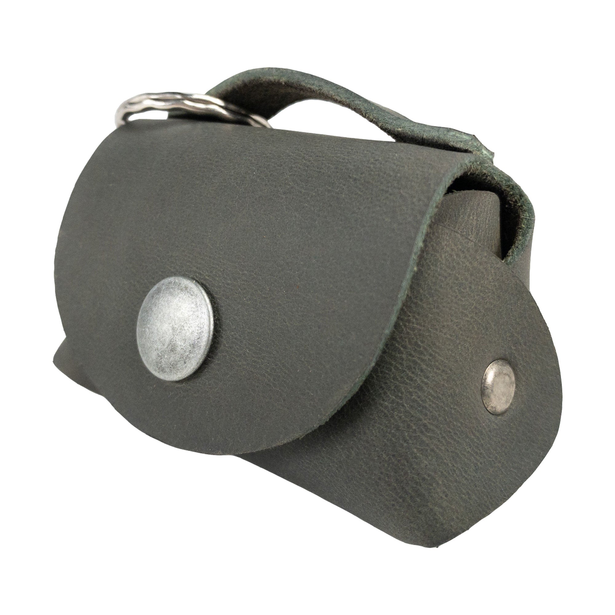Tiny Handbag Keychain by Hide & Drink, showcasing a stylish Tiny Handbag with Key Ring Holder made from Full Grain Leather. This artisan piece represents Small Batch Production, and is Hand Cut, Hand Sewn, and Fire Branded. It is proudly Handmade in La Antigua Guatemala & Oaxaca Mexico.