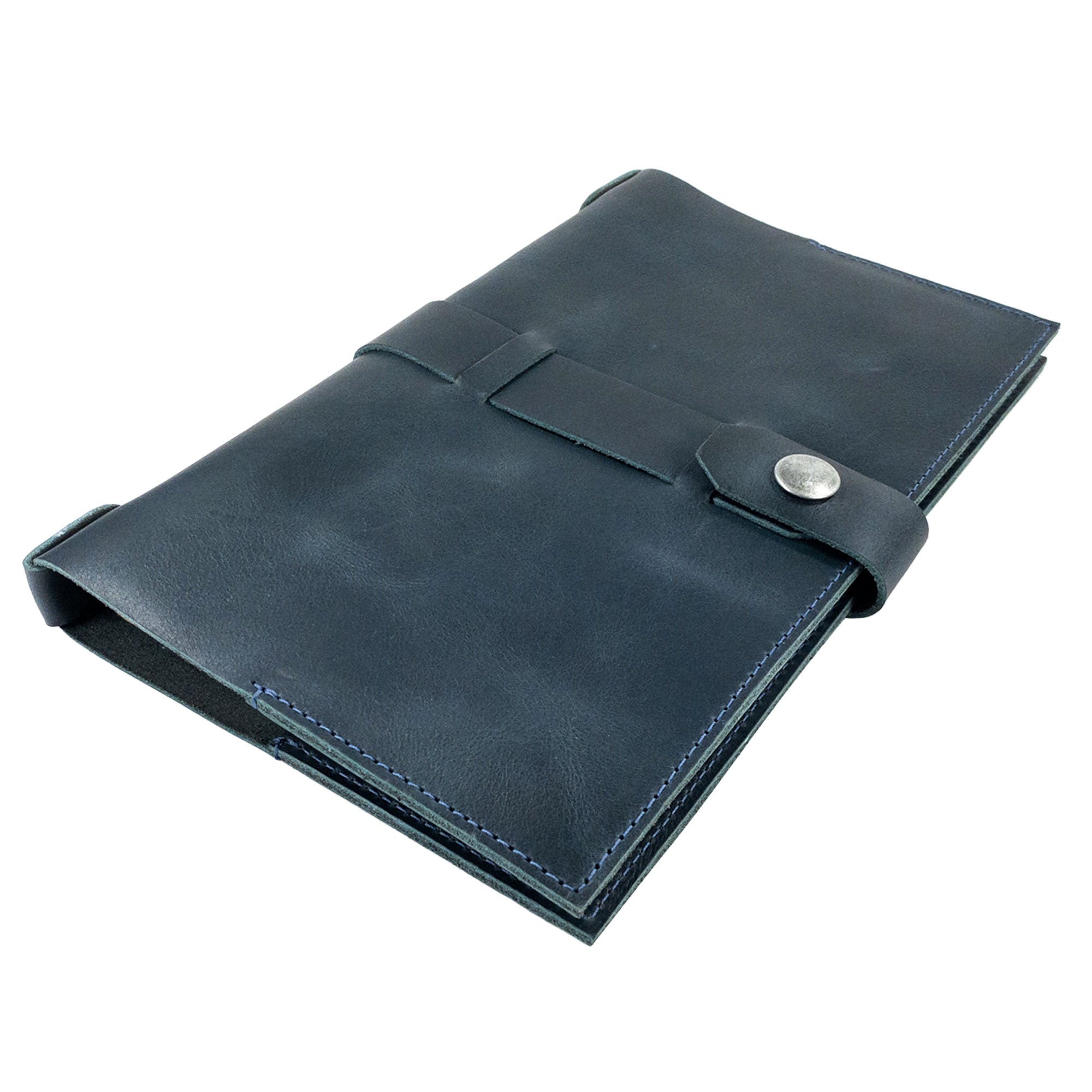 Artisan view of Hide & Drink's Riveted Field Note Cover for Moleskine (5 x 8.25 in.) Notebook NOT Included, showcasing its rich brown leather finish. A handmade masterpiece, it reflects responsible small batch production in La Antigua Guatemala & Oaxaca, Mexico.