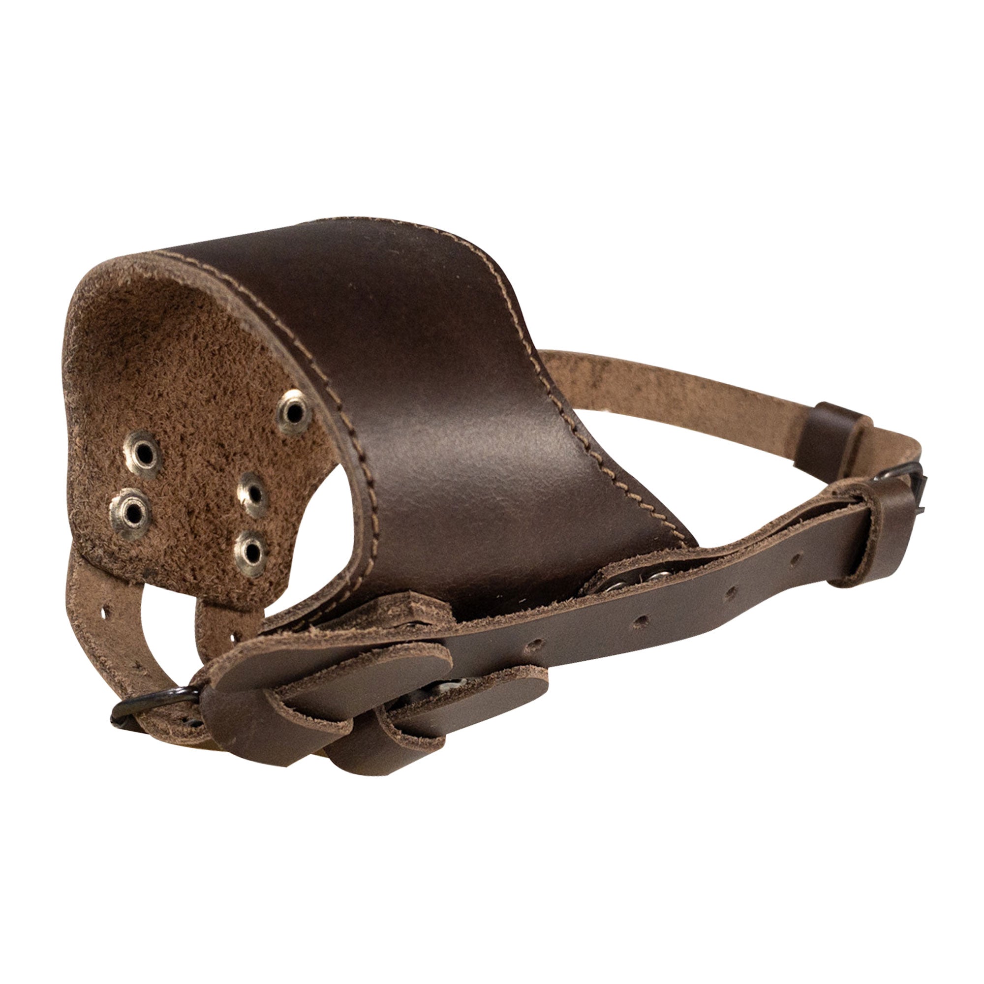 Side angle of the Adjustable Dog Muzzle by Taco Dog, designed for a secure fit while ensuring comfort for your pet. This durable muzzle is handmade with full grain leather, showcasing unique artisan style from La Antigua Guatemala.