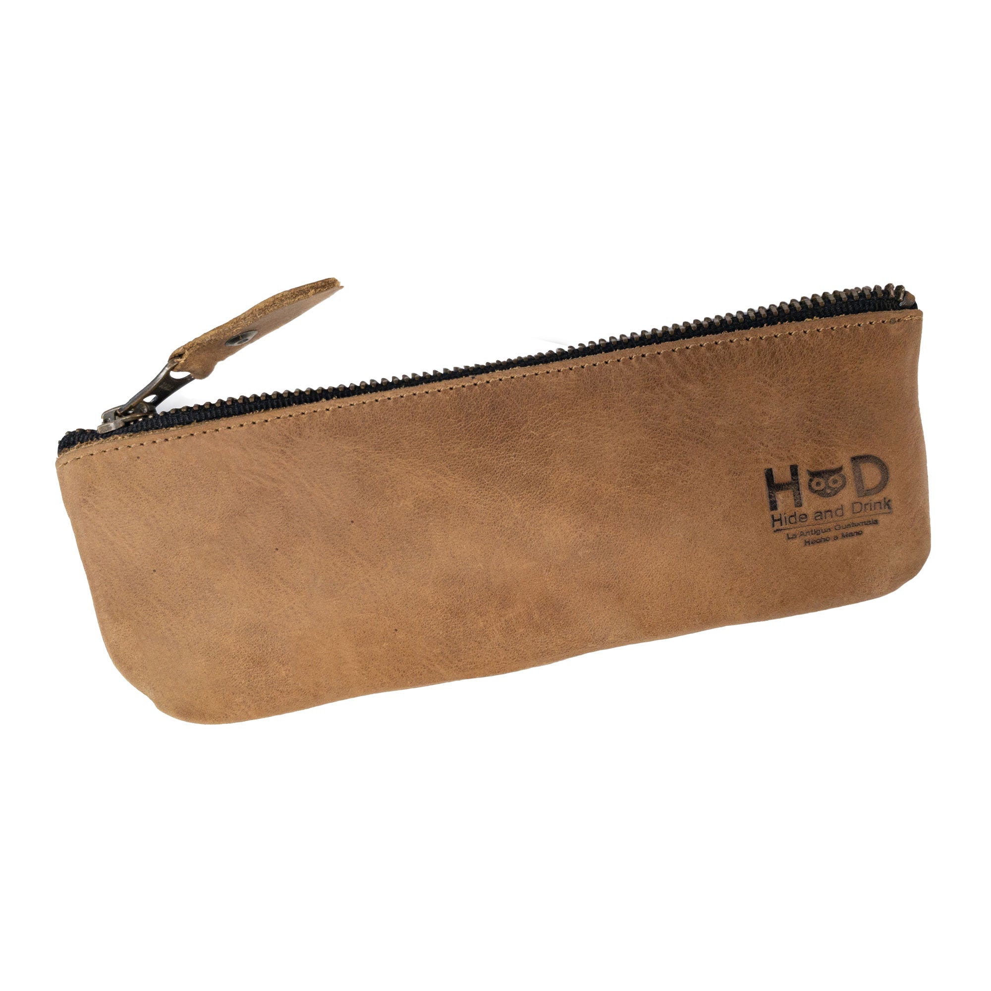 Hide & Drink Pencil Pouch displayed horizontally, emphasizing its full grain leather material. This rectangular pencil case is ideal for use as a pen & marker pouch for both men and women, featuring a sleek flat zippered holder. Artisan-crafted in La Antigua Guatemala & Oaxaca Mexico, highlighting the beauty of small batch production.