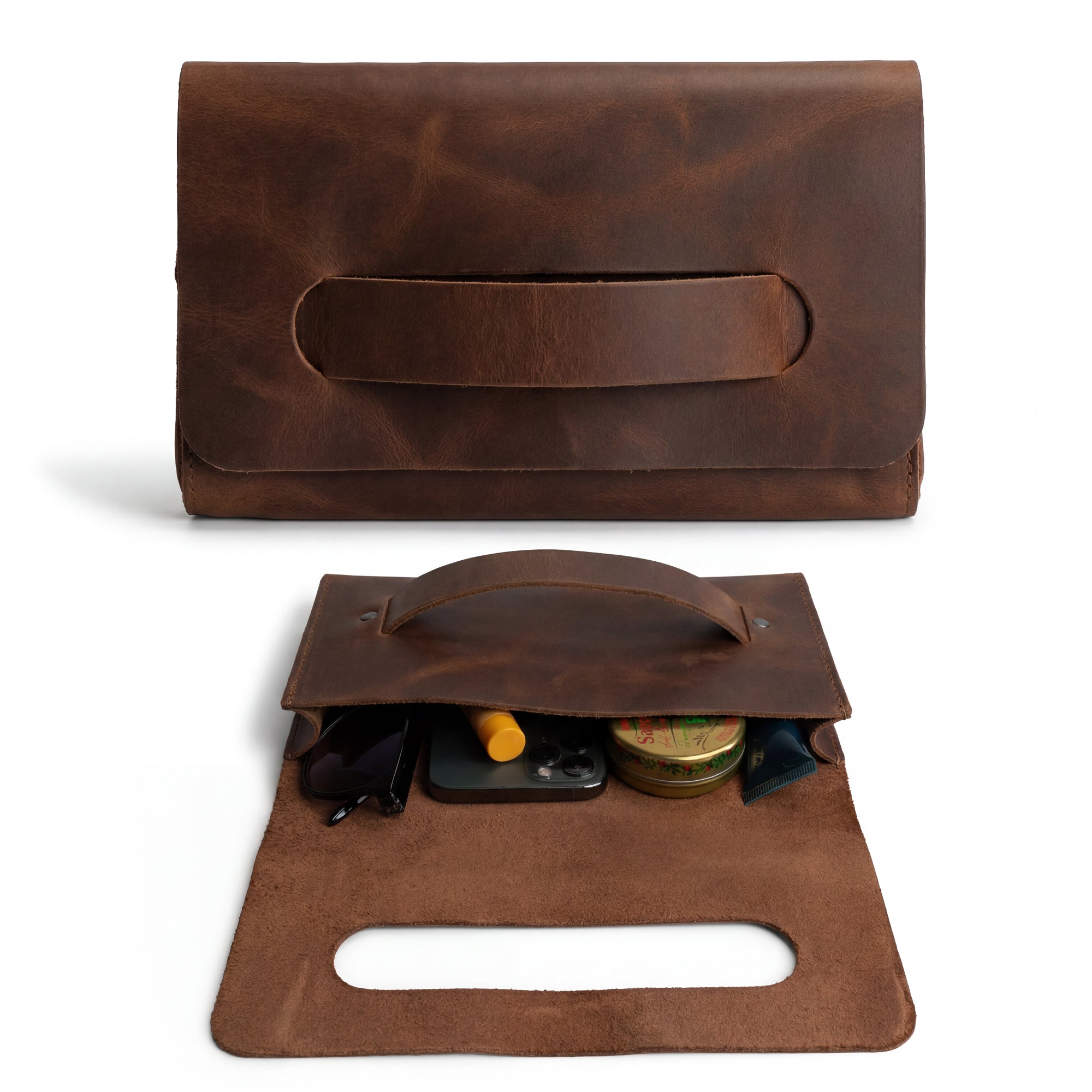 The interior of the Clutch Bag With Handle by Hide & Drink, showcasing organized space for essentials. This Full Grain Leather Clutch Bag with Handle is ideal for women seeking a fashionable handbag or night bag, crafted with artisan care in Guatemala and Mexico.