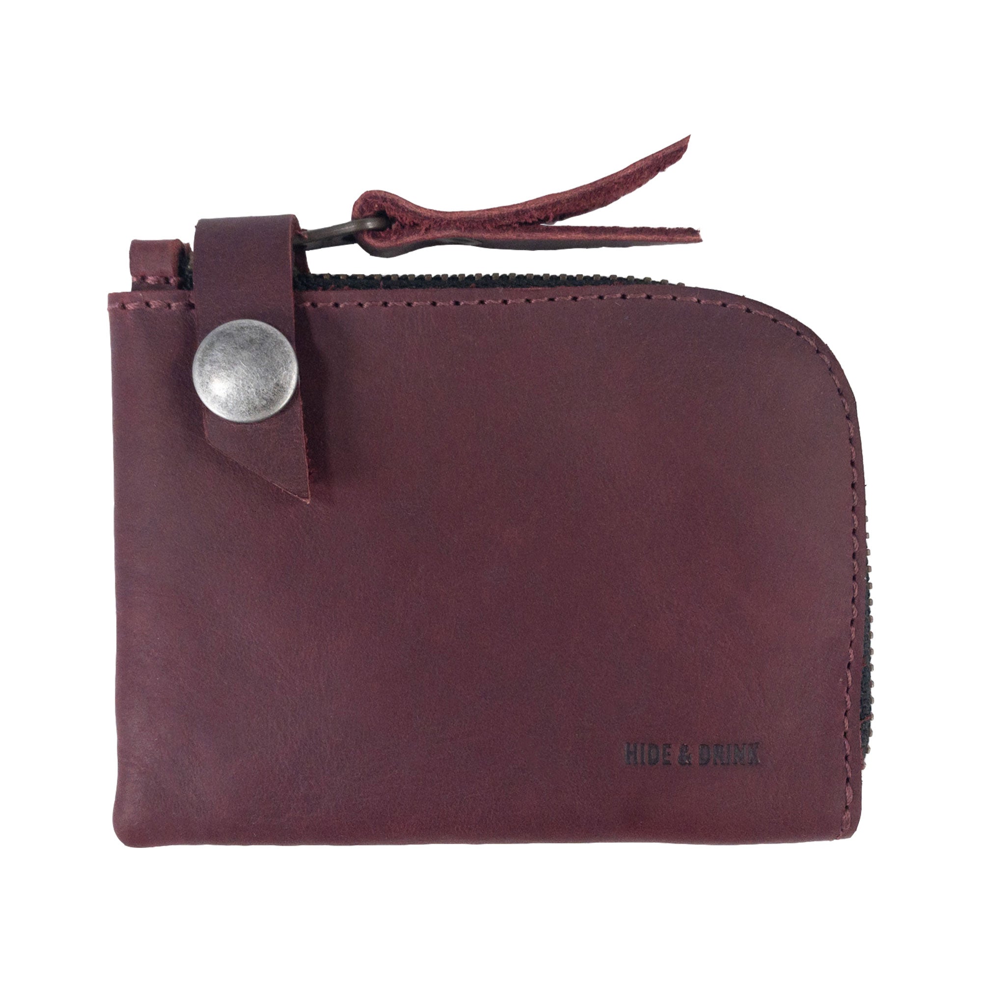 Lion's Mane Zippered Wallet by Hide & Drink, illustrating its spacious interior for cards and cash, an essential piece for any minimalist.