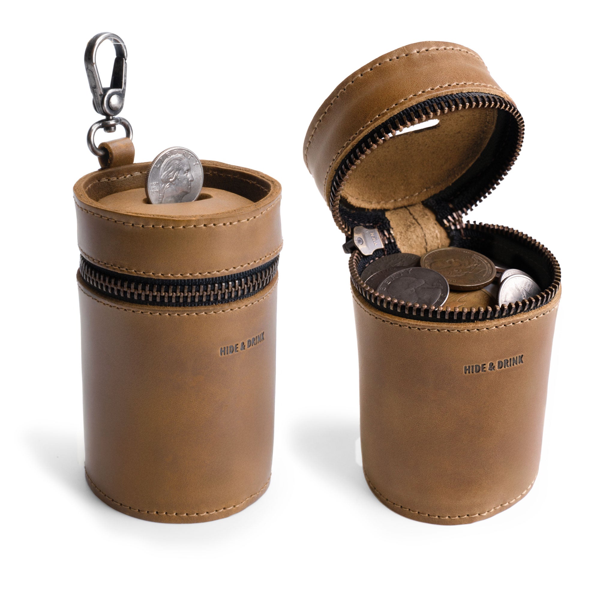 The Bucket Coin Release by Hide & Drink showcases a stylish Full Grain Leather Money Box with a zipper and durable clasp, perfect for organizing coins as a Piggy Bank Bucket. This compact Cash Organizer is ideal for everyday use, handcrafted in La Antigua Guatemala & Oaxaca Mexico.