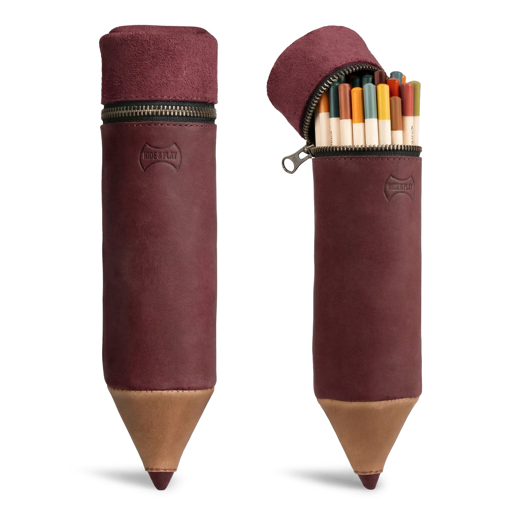A stylish Pencil-Shaped Case from Hide & Play, crafted from full grain leather, perfect for organizing pens, pencils, markers, and office accessories. This zippered bag showcases artisanal craftsmanship, featuring small batch production, hand cut, hand sewn, and fire branded elements. Handmade in La Antigua Guatemala.