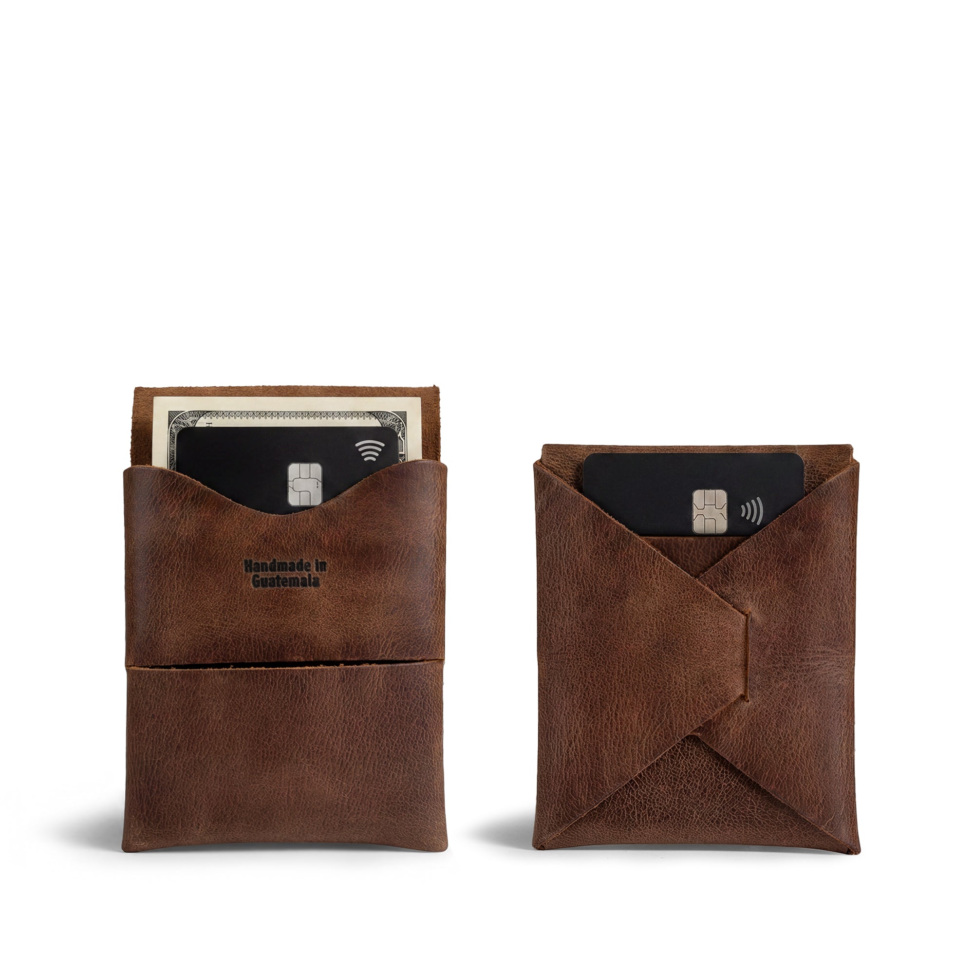 A beautifully crafted Origami Card Wallet from Hide & Drink, showcasing its sleek design, made from premium Full Grain Leather. This Leather Origami Card Holder serves as a Slim Wallet for Cards and Front Pocket Case for Debit & Credit Cards, perfect for minimalists. Hand Cut and Hand Sewn in La Antigua Guatemala & Oaxaca Mexico, it's an ideal compact business wallet with artisan craftsmanship.