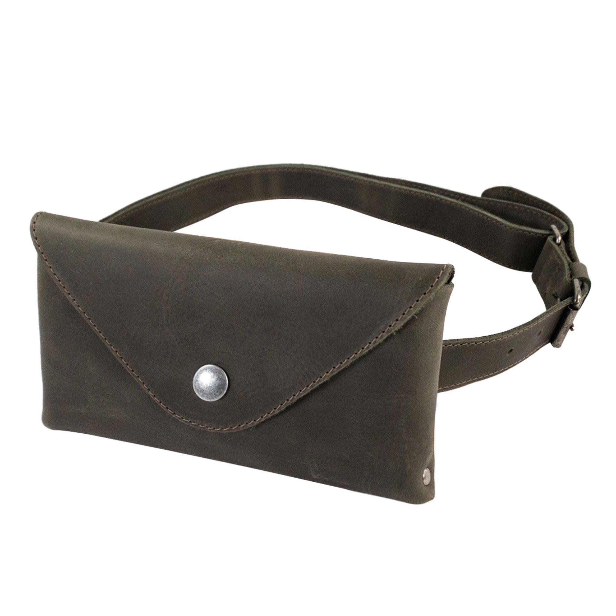 Hide & Drink's Fancy Fanny Pack in a multi-brown tone, designed for both fashion and function. This full grain leather waist pouch is ideal for storing essentials while traveling, handcrafted in small batches in La Antigua Guatemala.
