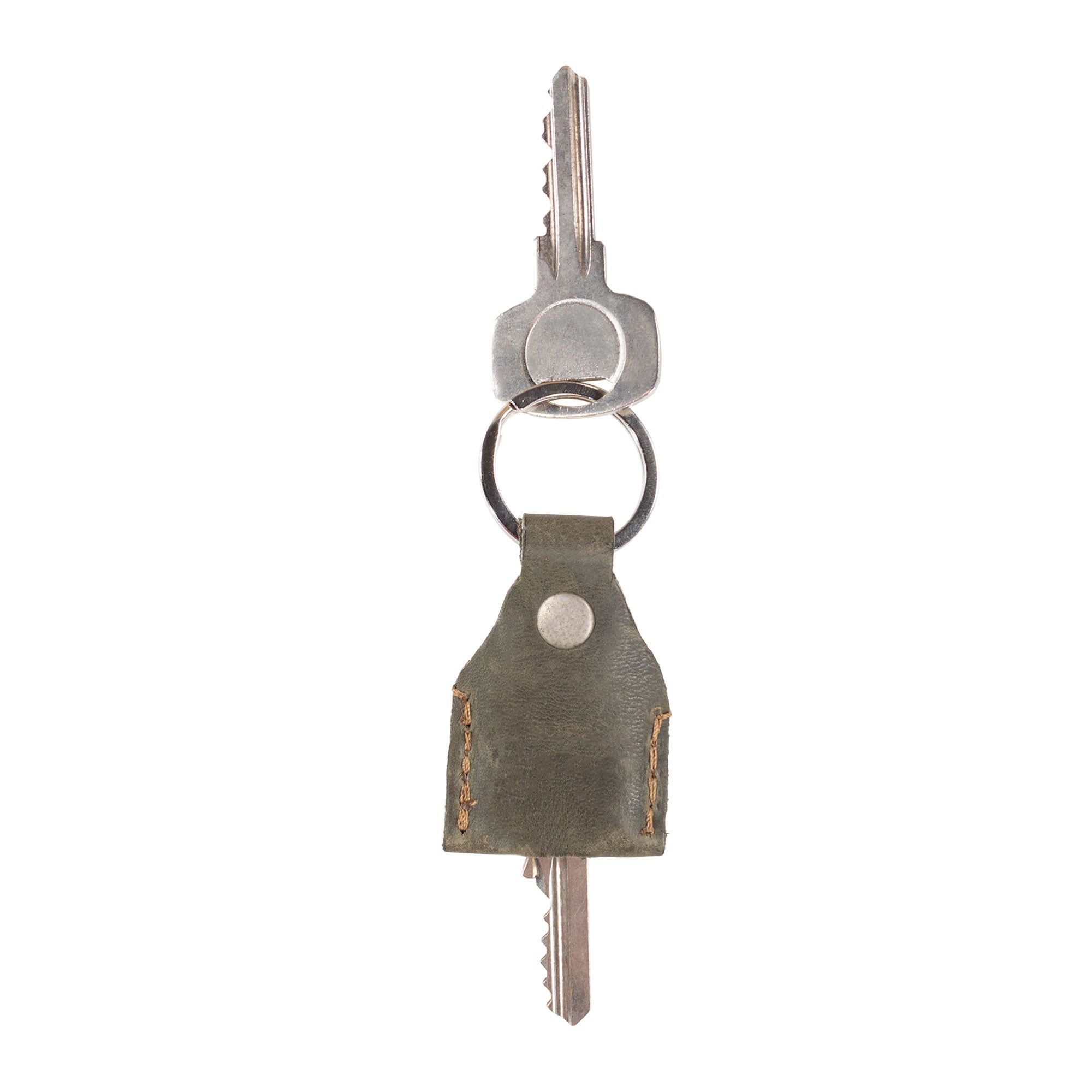 Hide & Drink Key Holder in rich chocolate brown leather, emphasizing its quality and design. This Key Holder is perfect for use as a Keychain Organizer and emergency coin pouch. Artisan-crafted in La Antigua Guatemala & Oaxaca Mexico with a focus on small batch production.