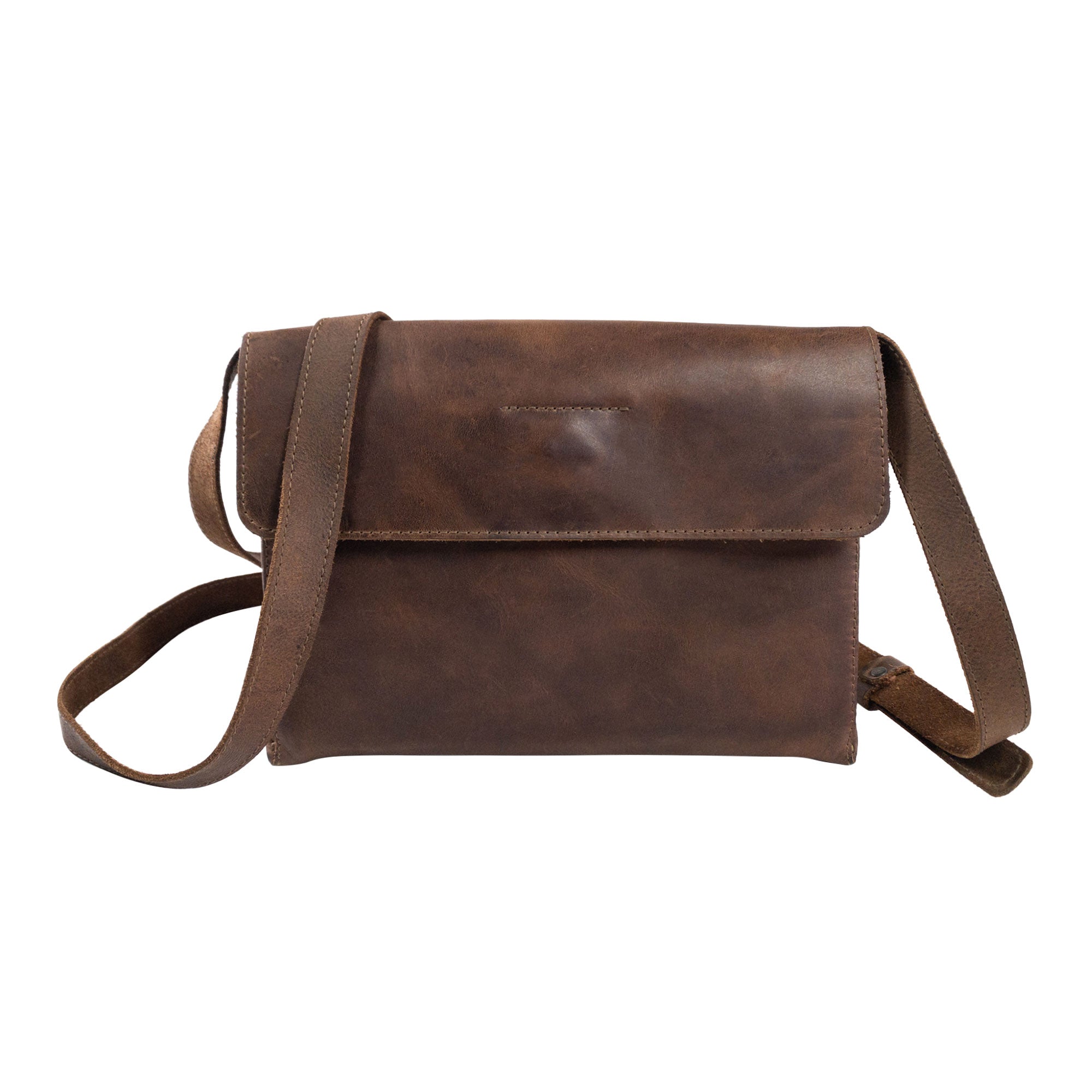 The Minimalist Shoulder Bag by Hide & Drink is a stylish, rectangular messenger bag crafted from full grain leather. This Mini Classic Shoulder Bag features an adjustable strap, making it a perfect travel accessory. Hand cut and hand sewn, this artisan piece showcases small batch production and fire branded detailing, embodying craftsmanship from La Antigua Guatemala & Oaxaca Mexico.