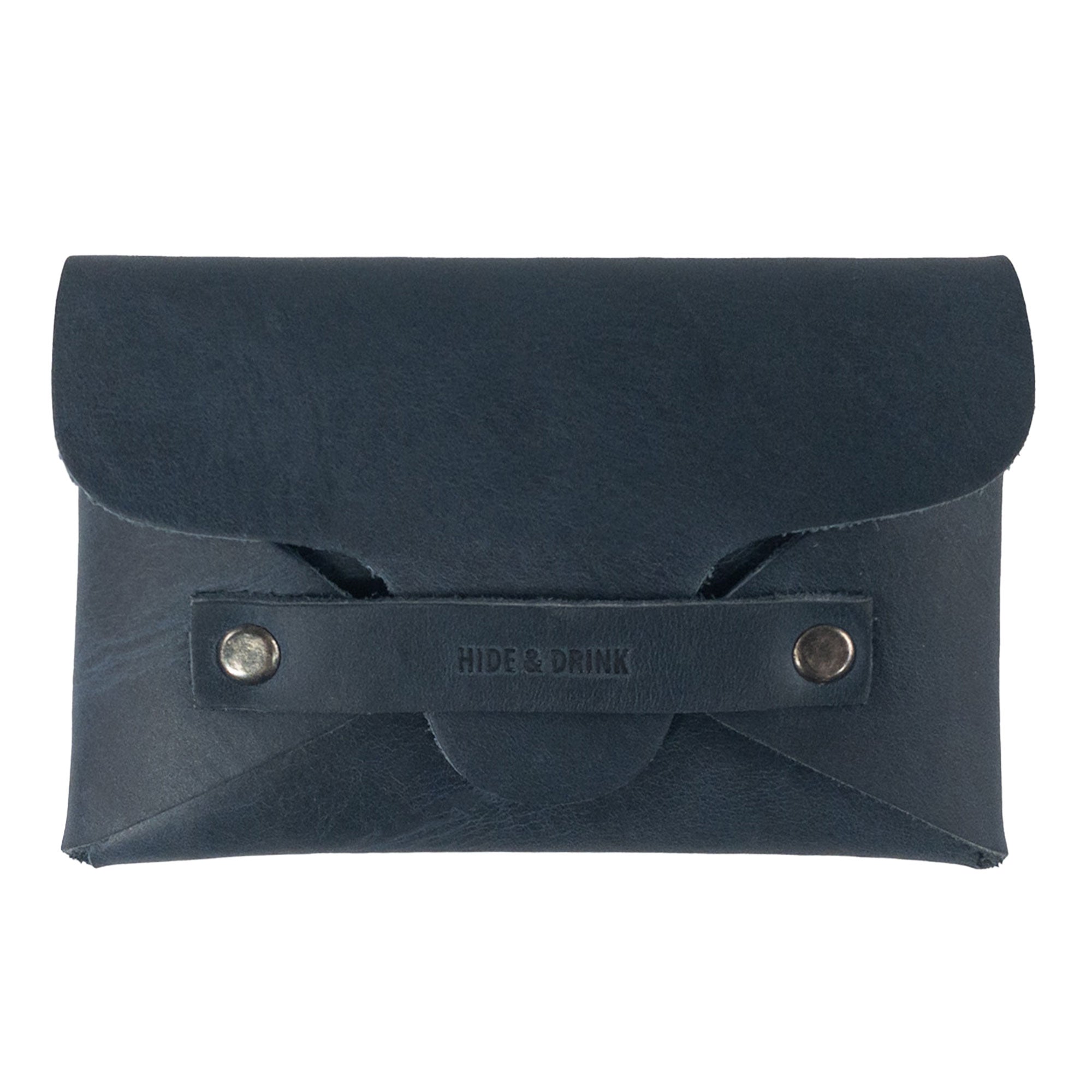 The elegant design of a Snapless Business Card Holder by Hide & Drink, showcasing its fine craftsmanship. This vintage wallet intended for men and women is created from resilient Full Grain Leather, serving as a reliable pouch and money organizer, made with artisan skill in La Antigua Guatemala and Oaxaca Mexico.