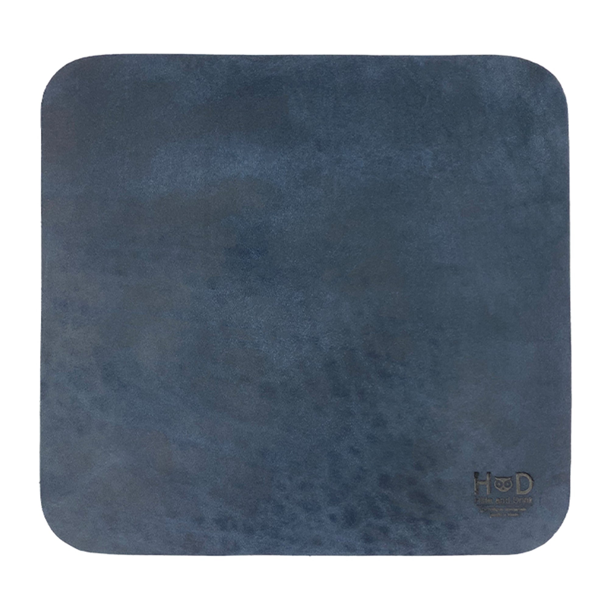 Hide & Drink Mousepad presenting a unique dark blue leather finish, perfect for a sophisticated workspace. This handmade mousepad offers an ergonomic non-slip base for better mouse control, crafted in La Antigua Guatemala & Oaxaca Mexico.