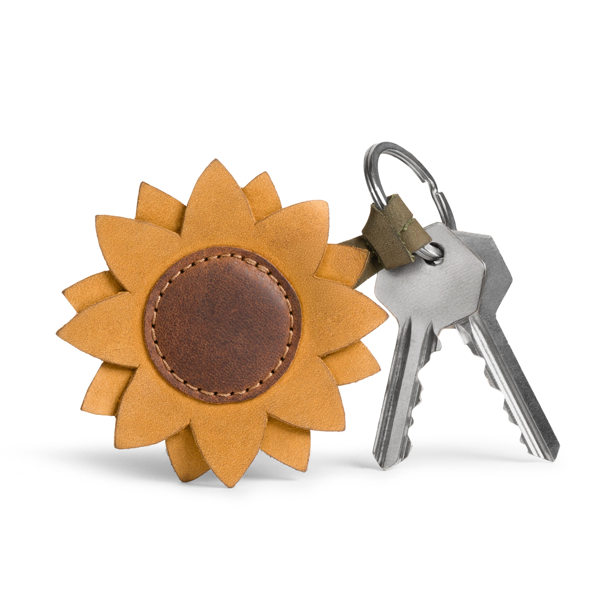 Sunflower Keychain by Hide & Drink displayed with keys, illustrating its stylish accessory design in full grain leather for easy attachment, artisan crafted in Oaxaca Mexico.