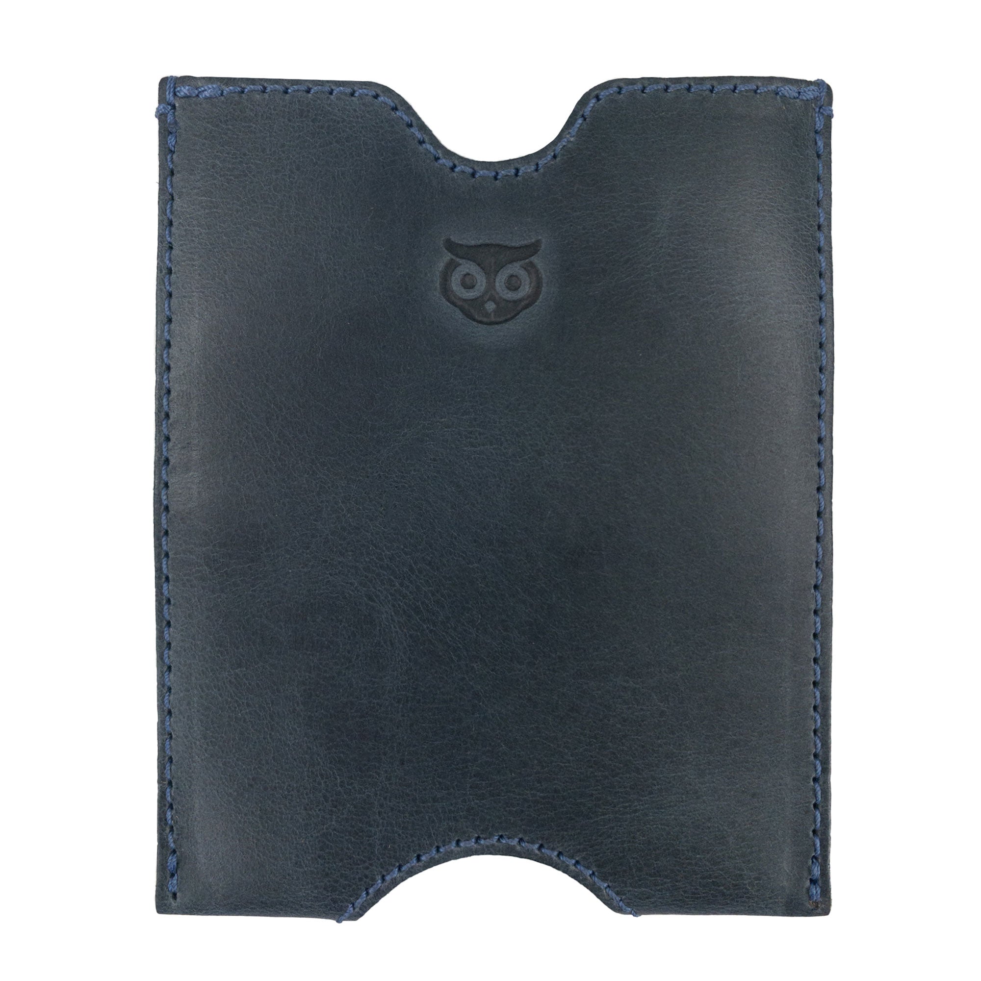 Showcasing the Hide & Drink Passport Sleeve, a travel passport pocket sleeve made from luxurious full grain leather. Its artisan craftsmanship makes it a unique and stylish choice for any traveler. Features tags: Travel Passport Pocket Sleeve, Full Grain Leather, StockyardX, Small Batch Production, Hand Cut, Hand Sewn, Fire Branded, Artisan, Handmade in La Antigua Guatemala & Oaxaca Mexico.