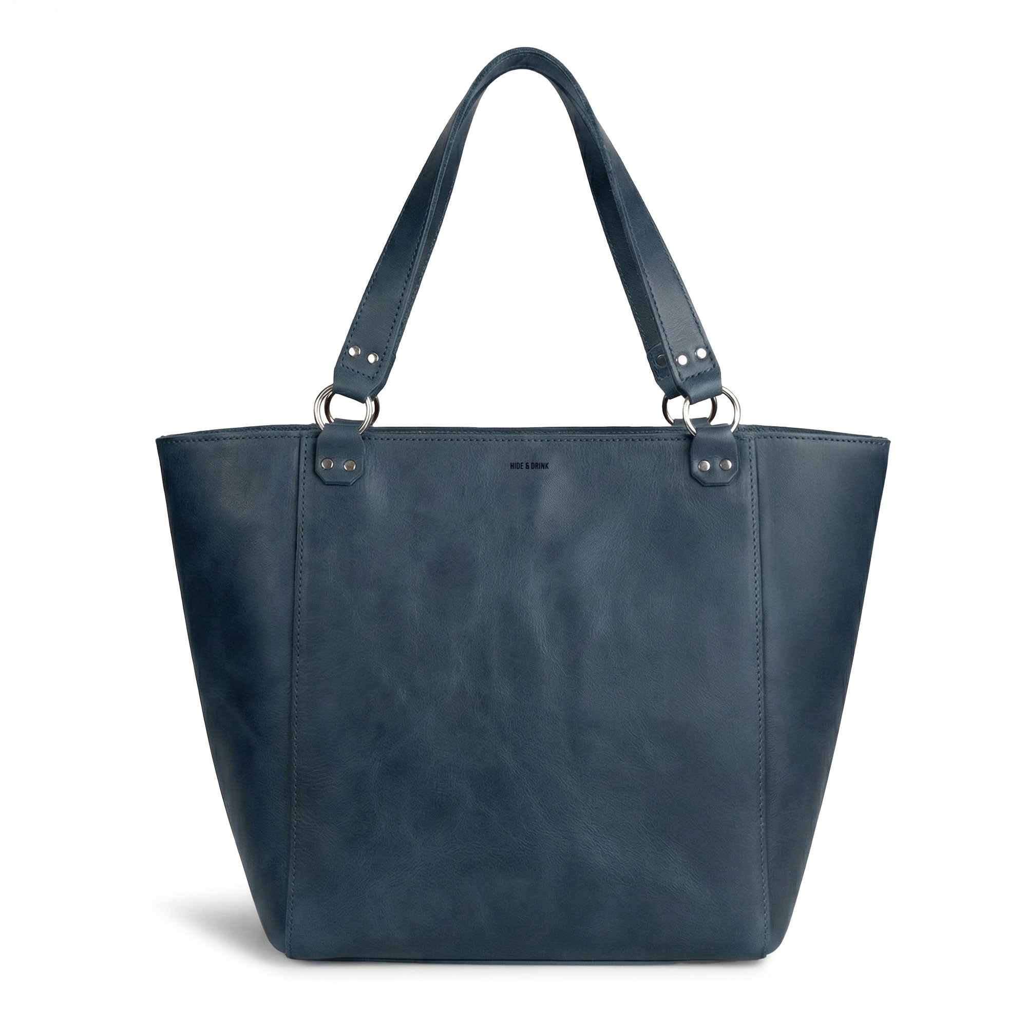 Spacious inside view of the Leather Formal Handbag by Hide & Drink, displaying its Full Grain Leather craftsmanship. This bag serves well as a Female Formal Handbag, Shoulder Bag, or Shopping Bag and is perfect for girls. Handmade in La Antigua Guatemala & Oaxaca Mexico.