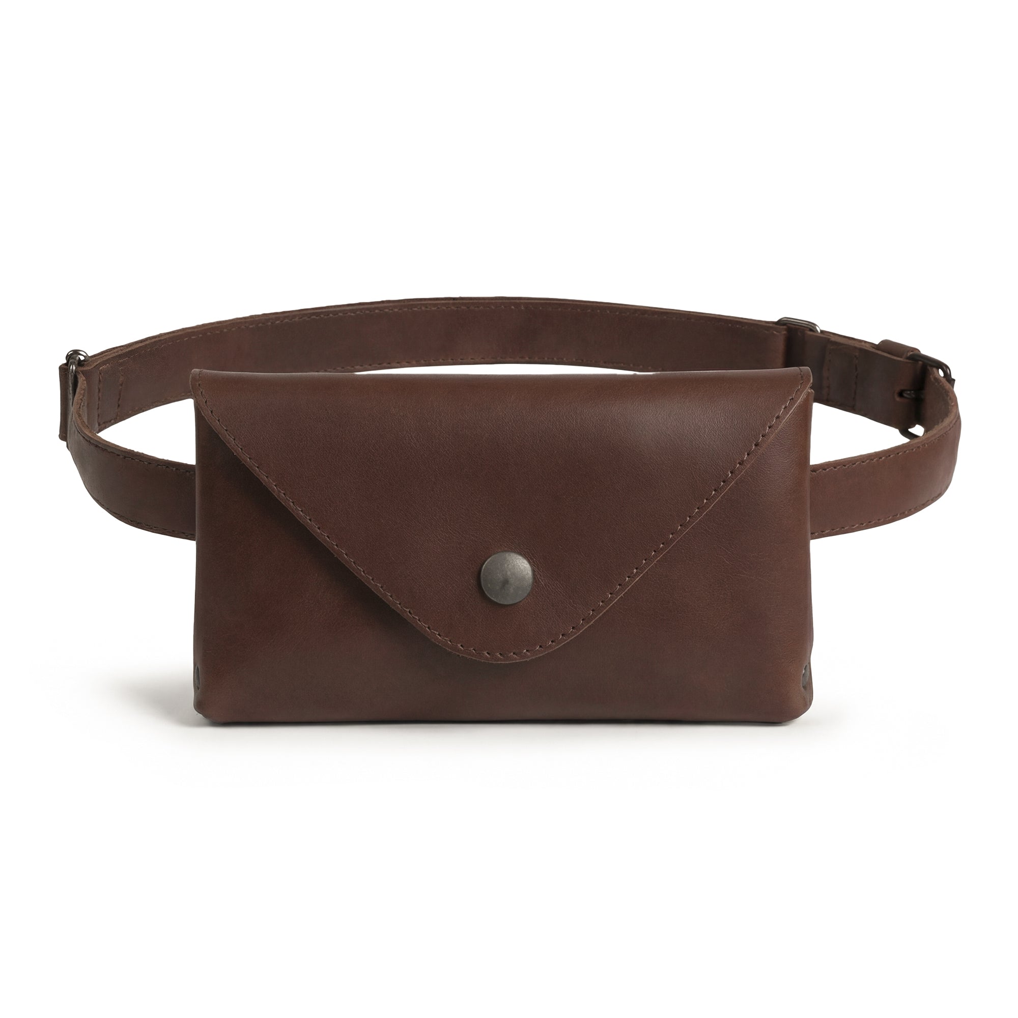 Hide & Drink's Fancy Fanny Pack in rustic full grain leather. This artisan-made waist pouch combines style and functionality, perfect as a vintage purse or phone holder. Ideal for easy travel for digital nomads, featuring small batch production, hand cut, and hand sewn craftsmanship, handmade in La Antigua Guatemala.