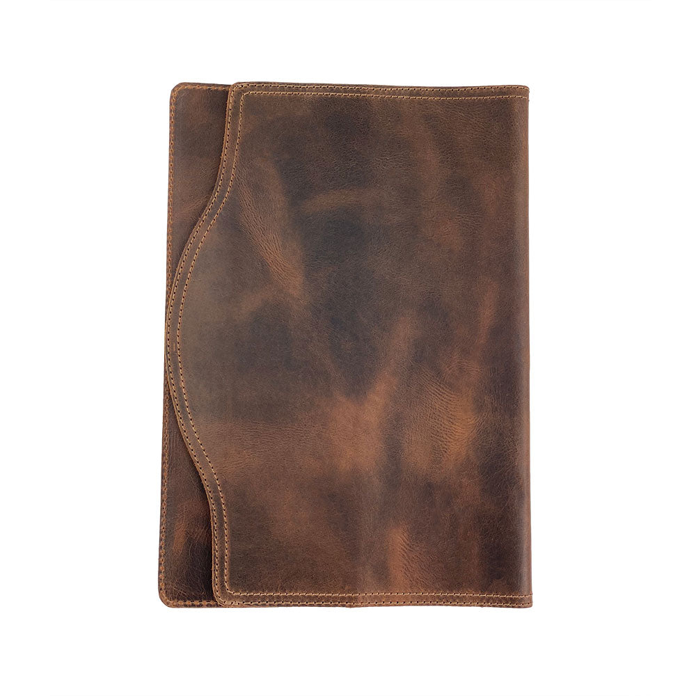 The Hard Cover Notebook Protector (Notebook NOT Included) by Hide & Drink displayed, emphasizing its stylish front cover. This leather journal cover suits Moleskine Hard Cover Sketchbook XXL Size (8.5 x 11 in.), with Full Grain Leather sourced from StockyardX. It's crafted through small batch production, ensuring each piece is hand cut, hand sewn, and fire branded for authenticity, all handmade in La Antigua Guatemala & Oaxaca Mexico.