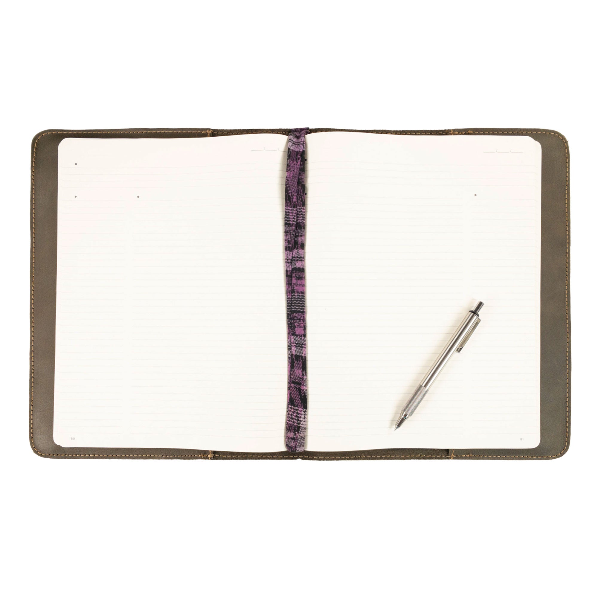 A close-up of the Journal Cover for (8.5 x 11 in.) Moleskine Cahier XXL from Hide & Drink, showcasing its premium quality material and artistry. This journal cover should be a staple for writers, featured in artisan production in La Antigua Guatemala & Oaxaca Mexico.