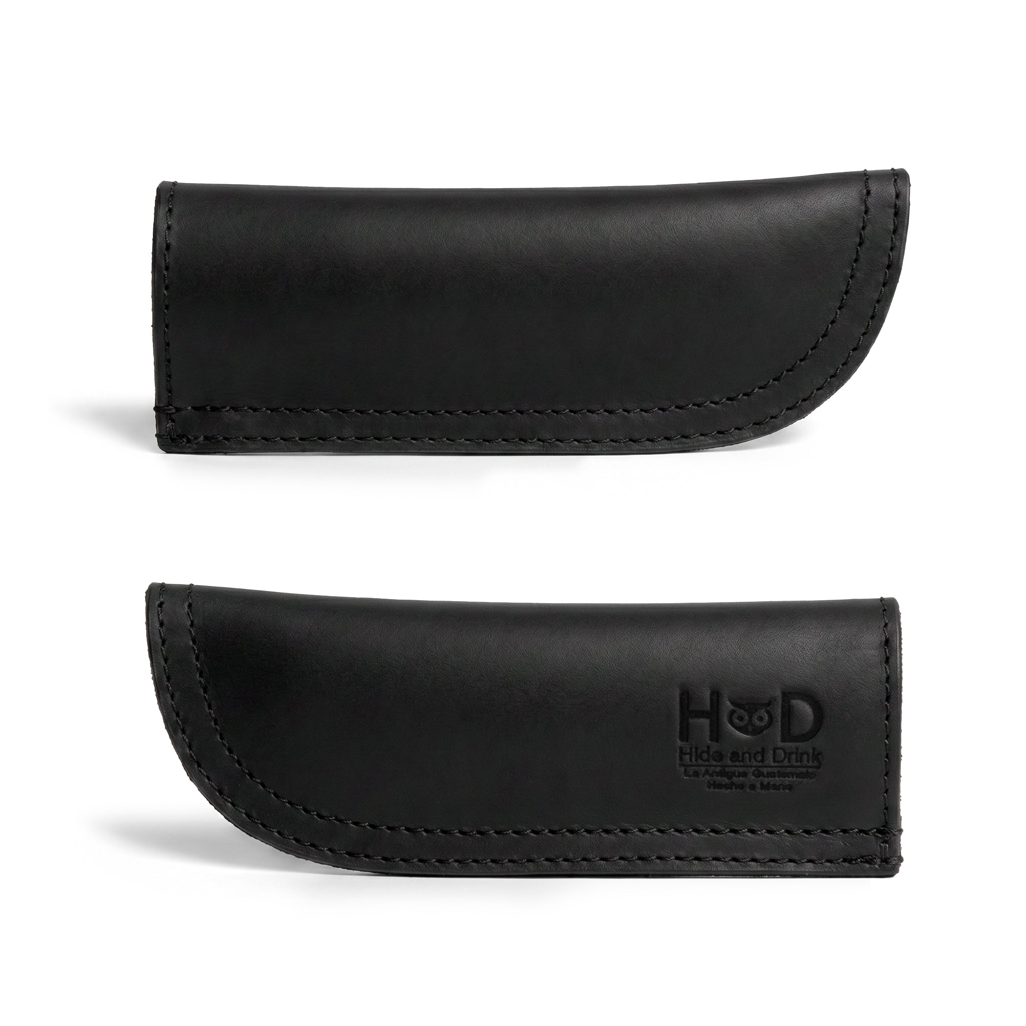 Hide & Drink Cast Iron Panhandle Cover showcased in a stylish angle, highlighting its craftsmanship. This hot handle protector, designed for easy application to metal skillets, exemplifies full grain leather quality. Handmade in La Antigua Guatemala & Oaxaca Mexico, it’s perfect for adding flair while cooking.