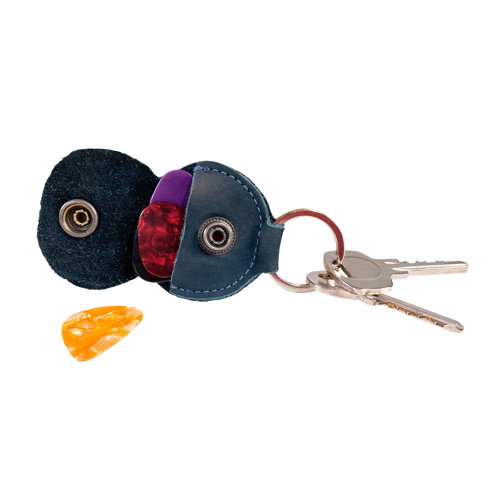 Hide & Drink Key Chain & Guitar Pick Holder, showcasing an ergonomic design with vibrant guitar picks. This keychain for guitar players is made from durable Full Grain Leather, emphasizing artisan craftsmanship and small batch production from La Antigua Guatemala & Oaxaca Mexico.