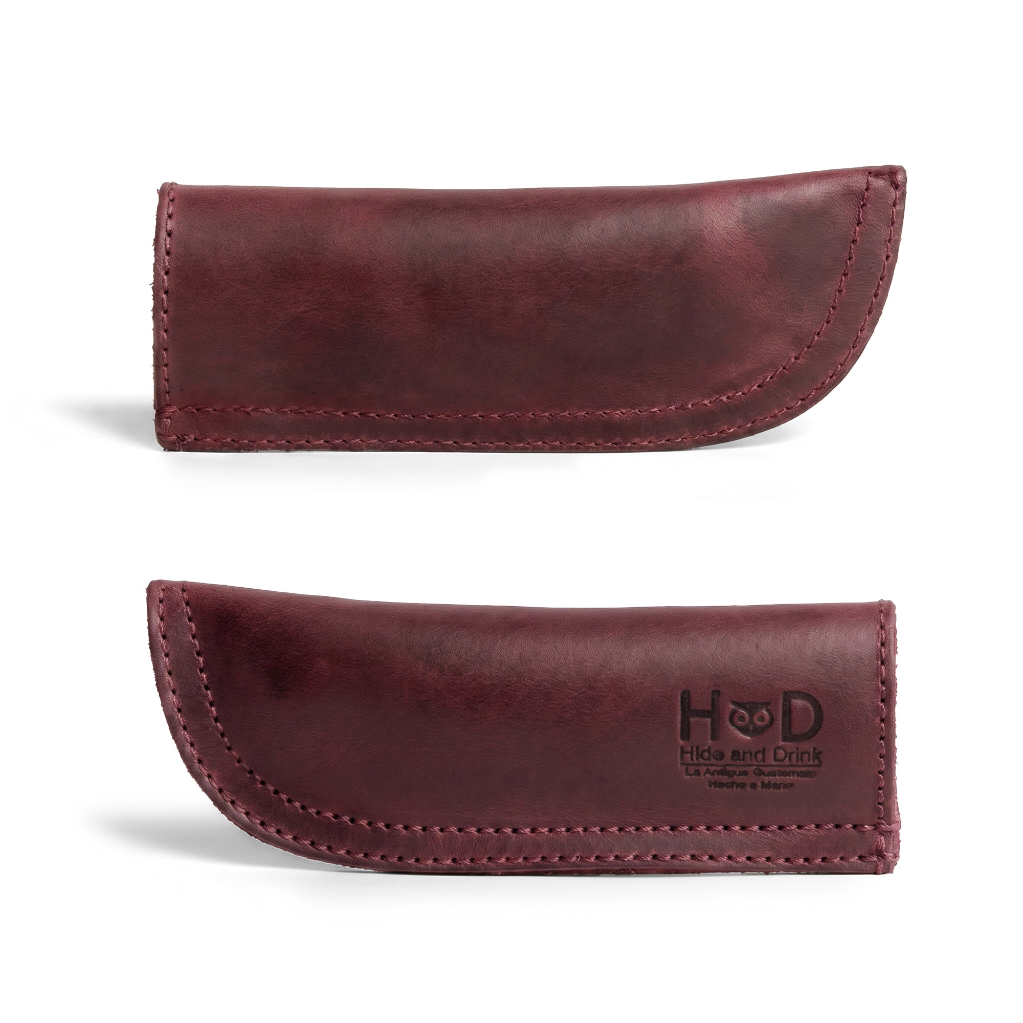Hide & Drink Cast Iron Panhandle Cover displayed with its detailed design. This unique artisan hot handle protector is made from full grain leather and features a double stitched construction for durability. Handmade in La Antigua Guatemala & Oaxaca Mexico, it’s perfect for any cooking enthusiast.