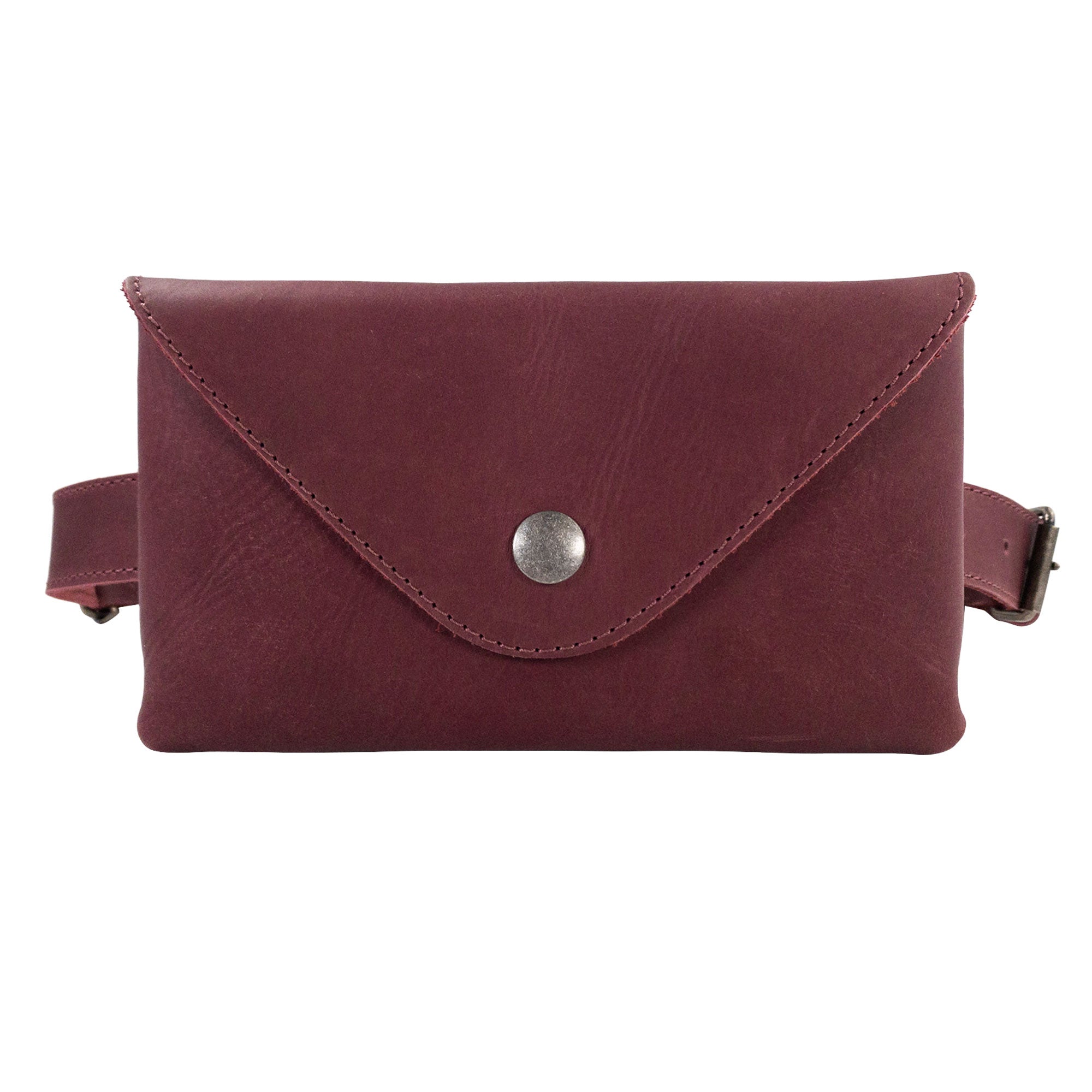 The Fancy Fanny Pack in rustic brown by Hide & Drink, showcasing its sturdy leather construction. Ideal as a fanny pack and phone holder, this artisan piece is handcrafted in small batches in La Antigua Guatemala.